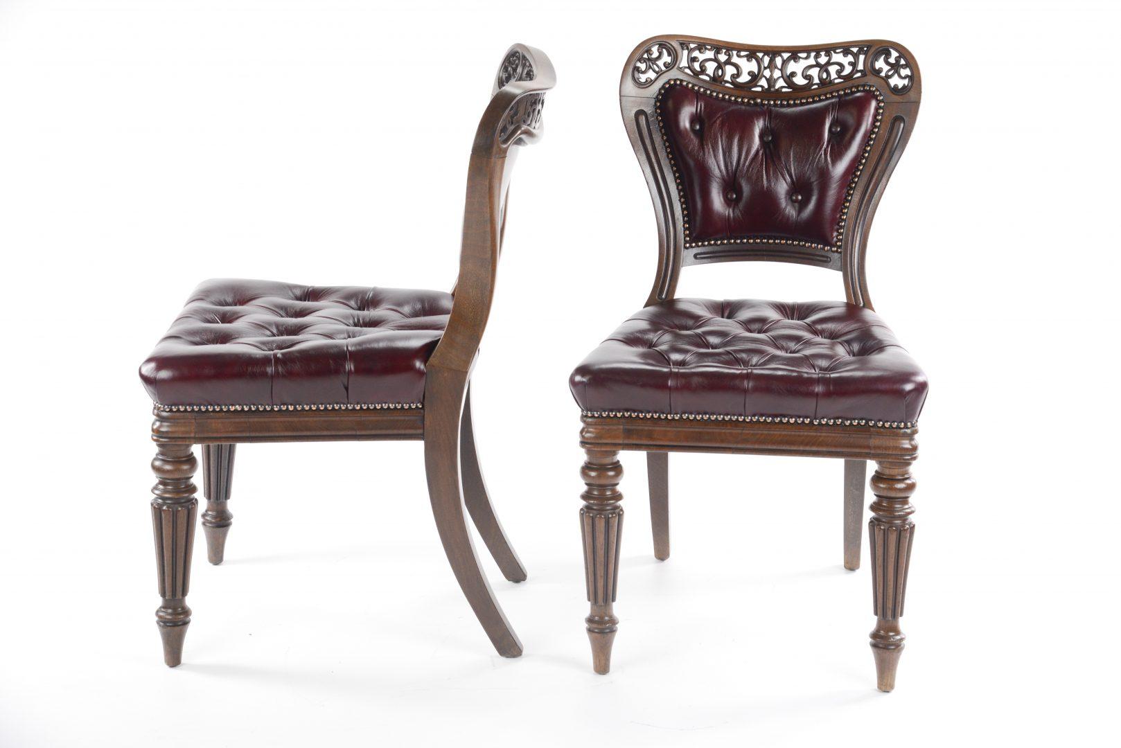 A very fine quality pair of George IV mahogany library chairs, firmly attributed to Gillows, pierced back rails and sides, in deep buttoned maroon leather backs and seats.


Gillows of Lancaster and London, also known as Gillow & Co., was an