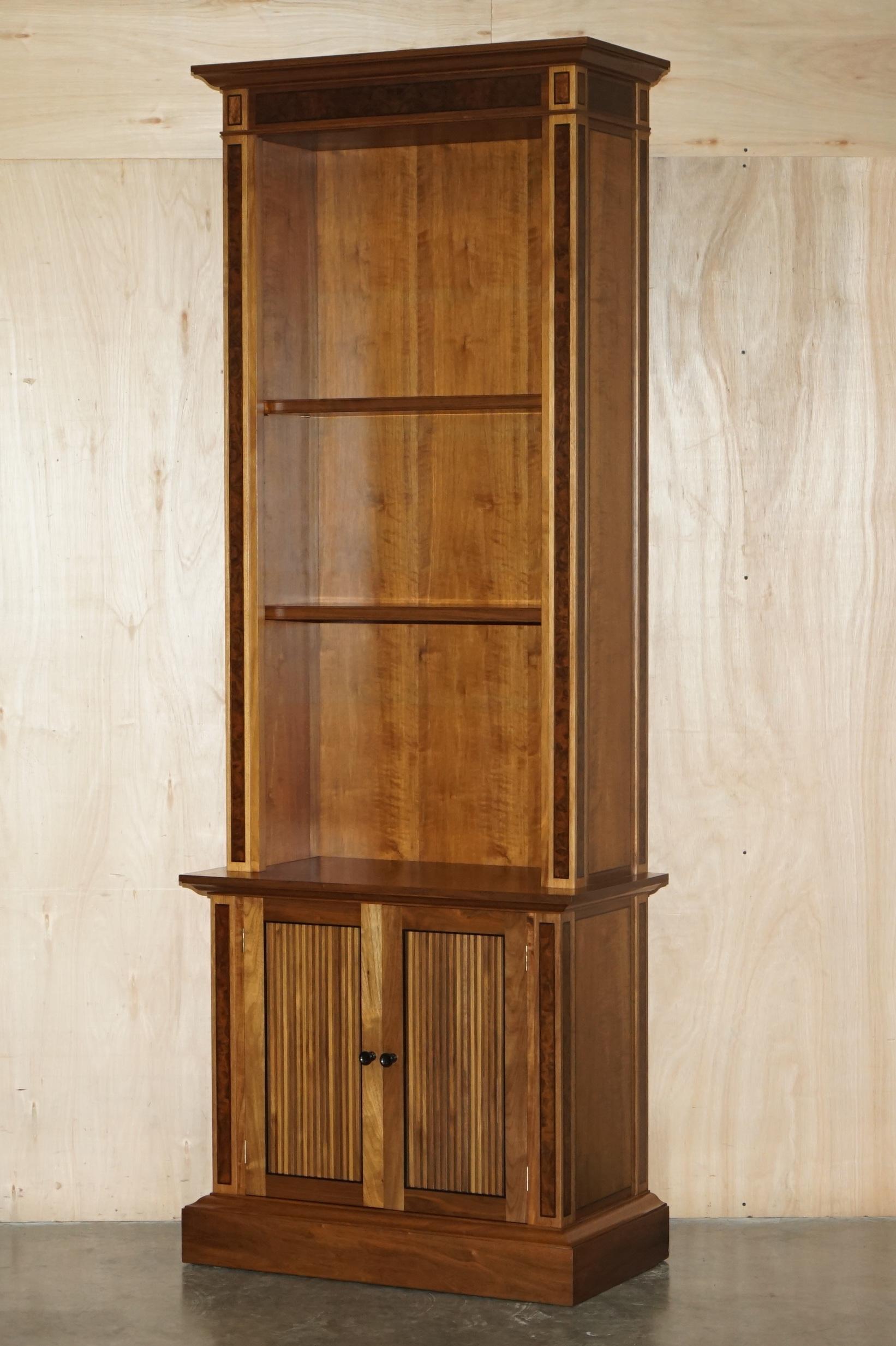 Royal House Antiques

Royal House Antiques is delighted to offer for sale this stunning pair of very tall Viscount David Linley Burr Walnut library bookcases which are part of a suite

Please note the delivery fee listed is just a guide, it covers