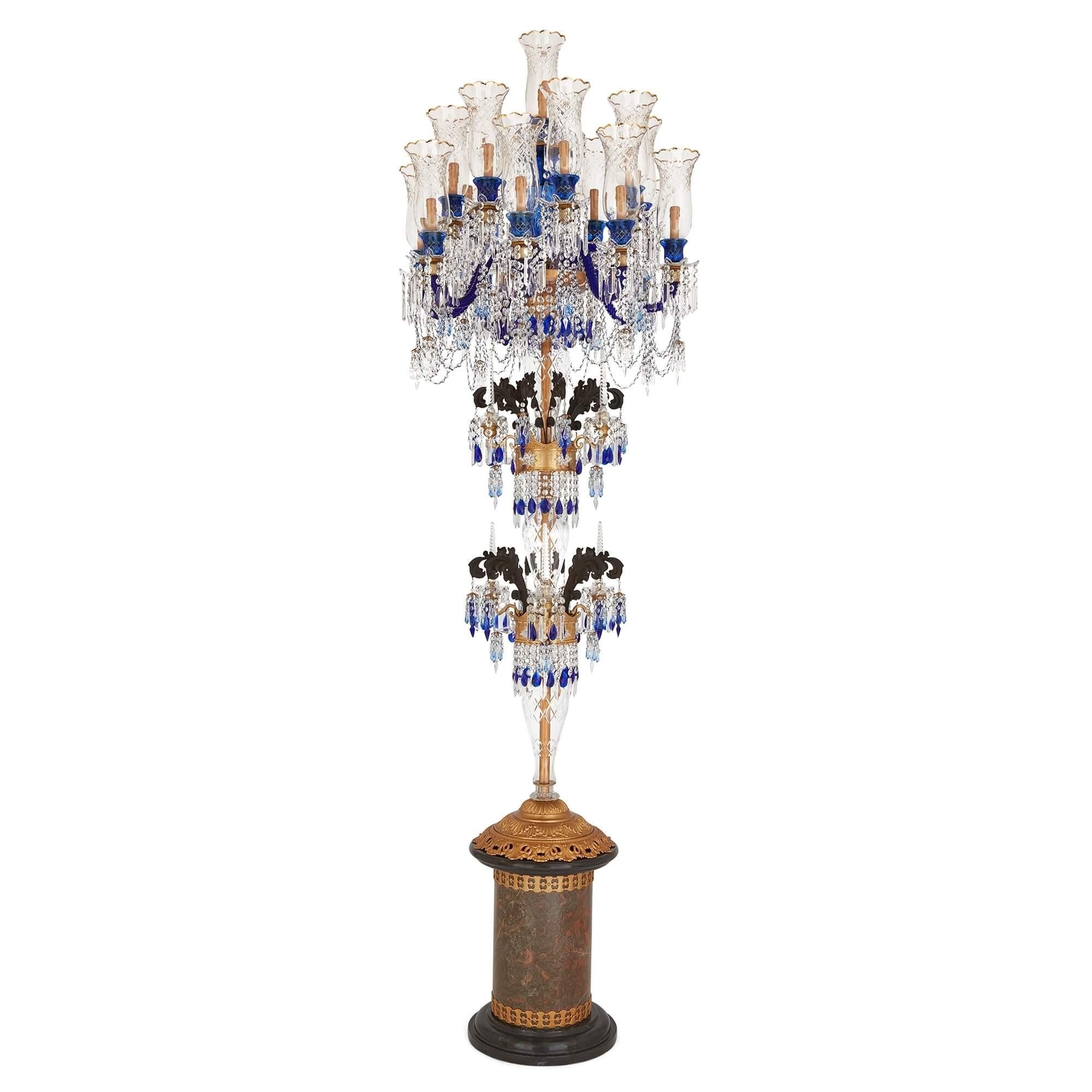 Pair of very large Bohemian blue and clear cut glass, marble and bronze candelabra
Bohemian, 20th Century 
Height 300cm, width 110cm, depth 110cm

This monumental pair of 20th century Bohemian candelabra is crafted from a selection of high quality