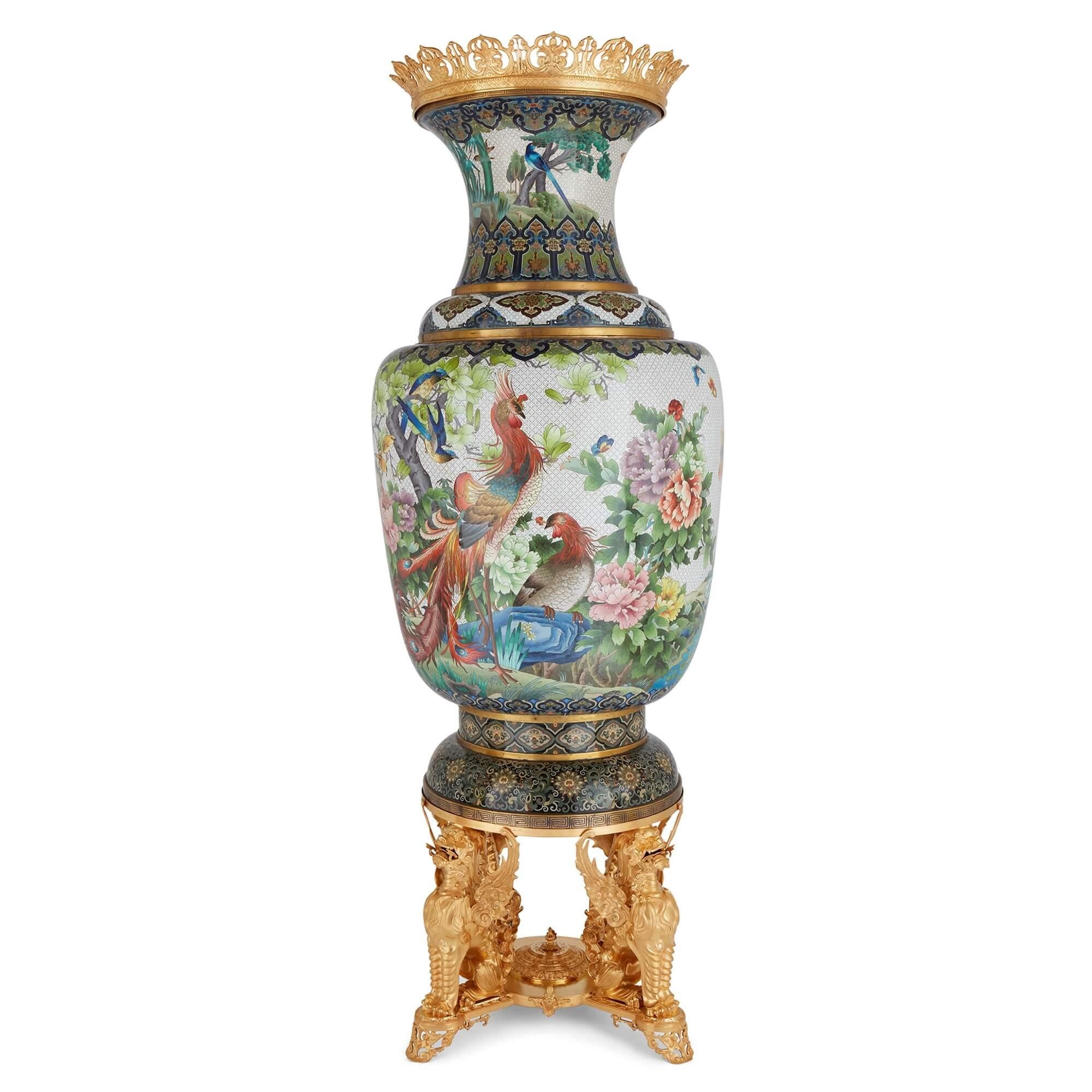 Pair of very large Chinese cloisonné enamel vases with French ormolu mounts 
Chinese and French, 20th century 
Height 215cm, diameter 78cm

These superb vases bring together exceptional Chinese enamelling with ornate French ormolu mounts, combining