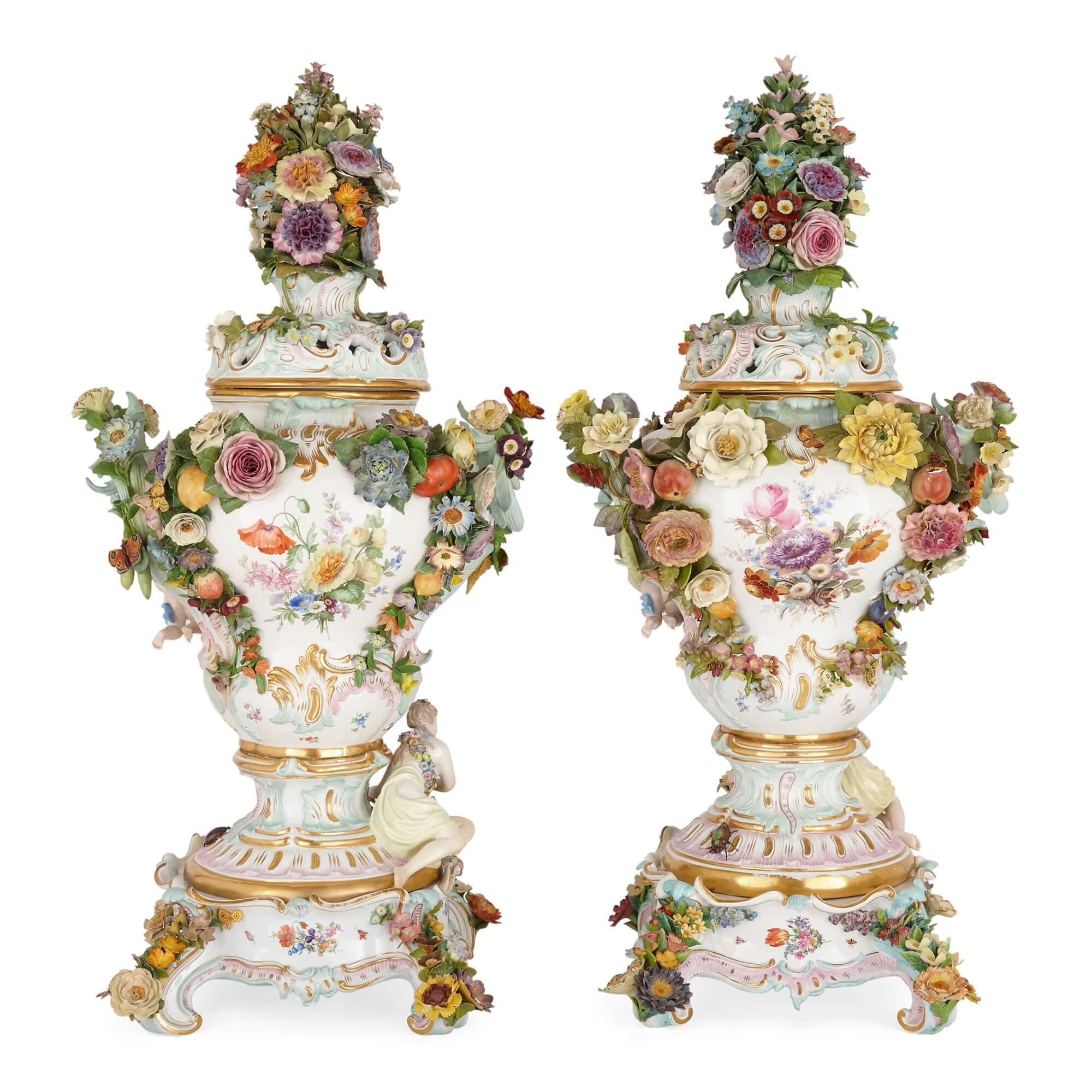 Pair of very large floral Rococo-style Meissen potpourri vases 
German, Late 19th Century 
Height 89cm, width 44cm, depth 33cm

These charming vases were manufactured by Meissen, Europe’s oldest porcelain manufactory. Each feature impressive