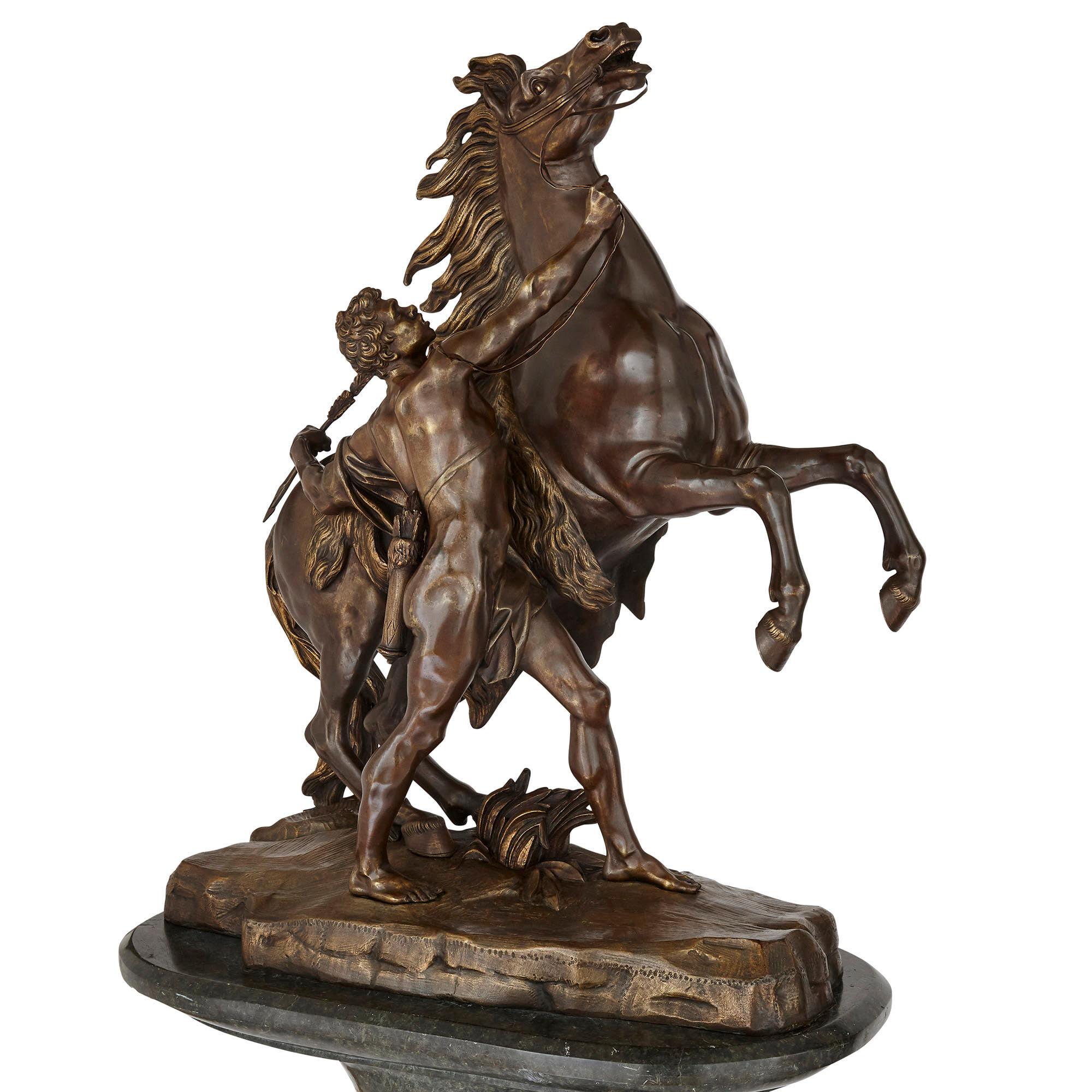Pair of very large patinated bronze Marly horses with marble pedestals
French, 19th century
Measures: Horses: Height 76cm, width 60cm, depth 32cm
Pedestals: Height 92cm, width 65cm, depth 36cm

These superb horses are unusually large examples