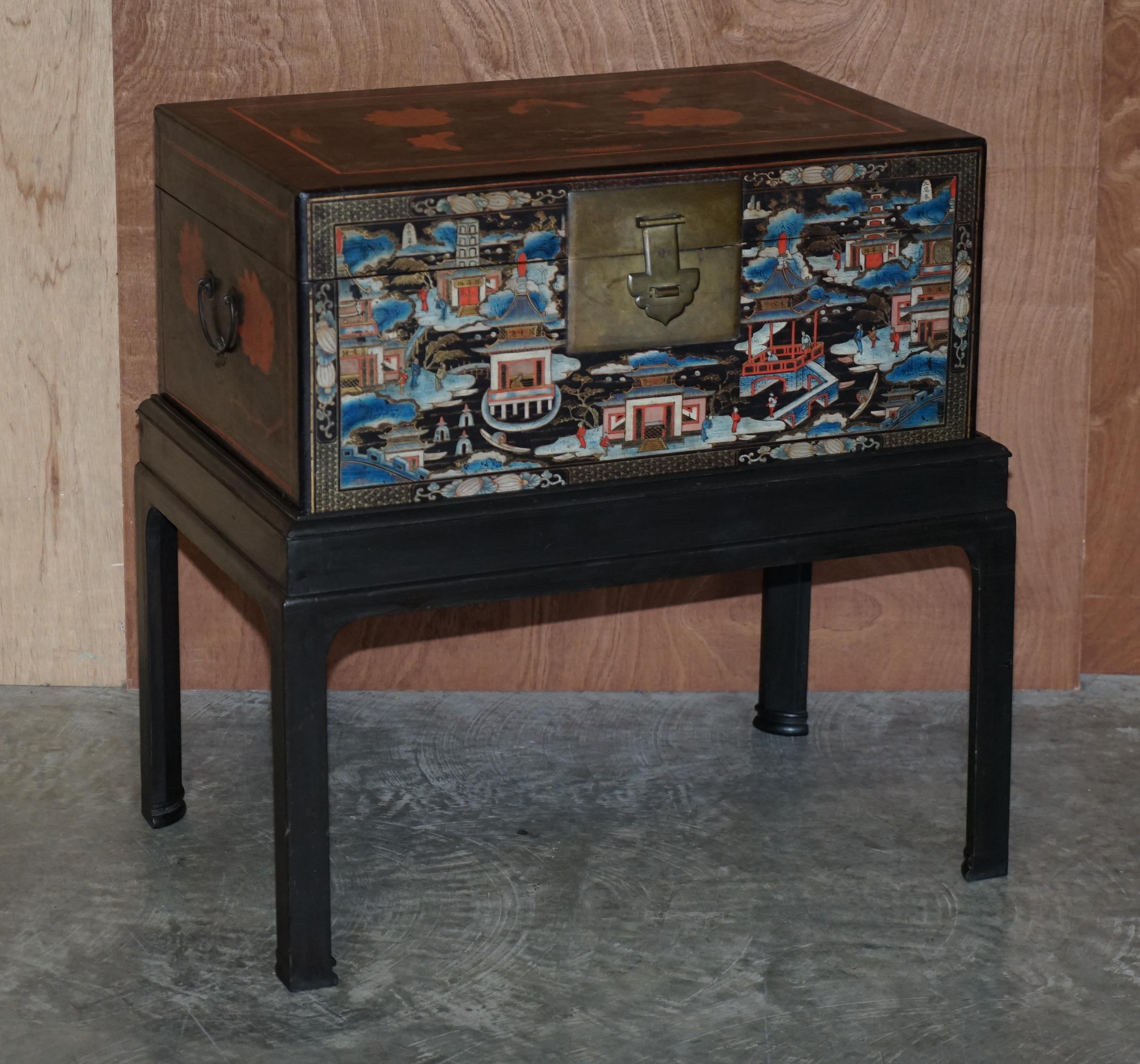 We are delighted to offer this lovely pair of original hand painted vintage Chinese trunks on stands which can be used as very large side tables

A very finely decorated pair, they are very large for the type and look expensive and important in