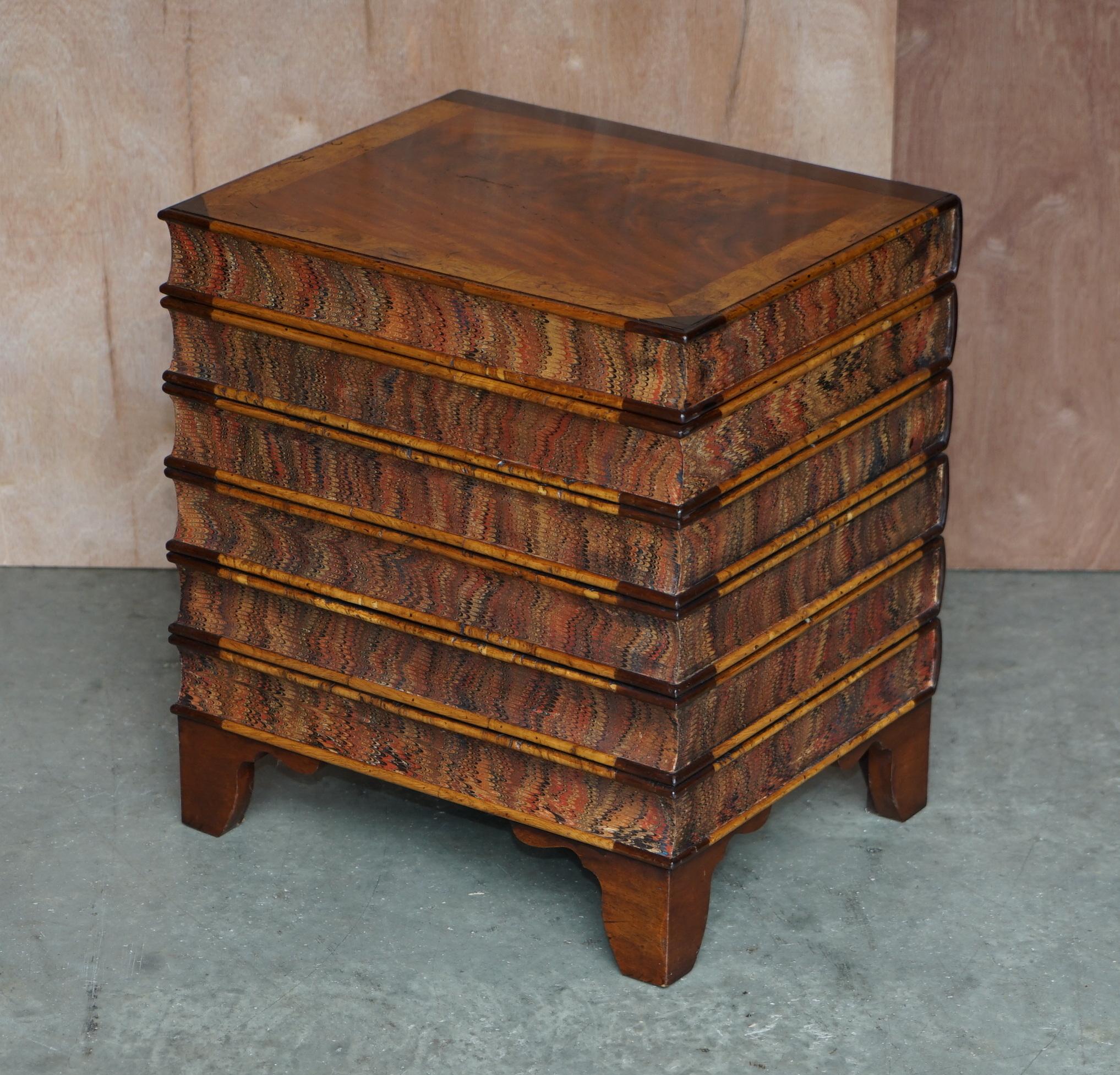 We are delighted to offer for sale this very rare pair of vintage fully restored flamed mahogany stacking books side tables with internal storage. 

A very rare pair, I have never seen this model before, they have Victorian style zigzag veneer on