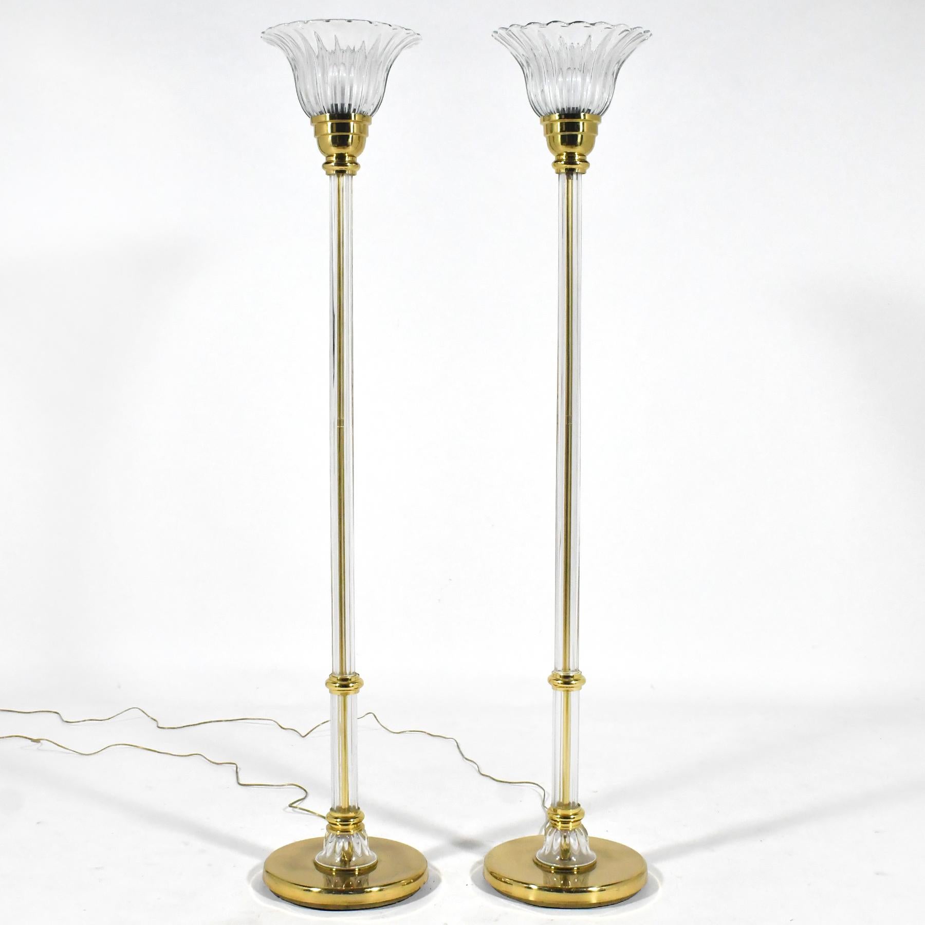 This striking and substantial pair of Murano glass torchier lamps by Vetri Artistica have brass bases, internal structures and details. The three-way switches are integral, controlled by touch. They date to the late 1970s and have an elegance that