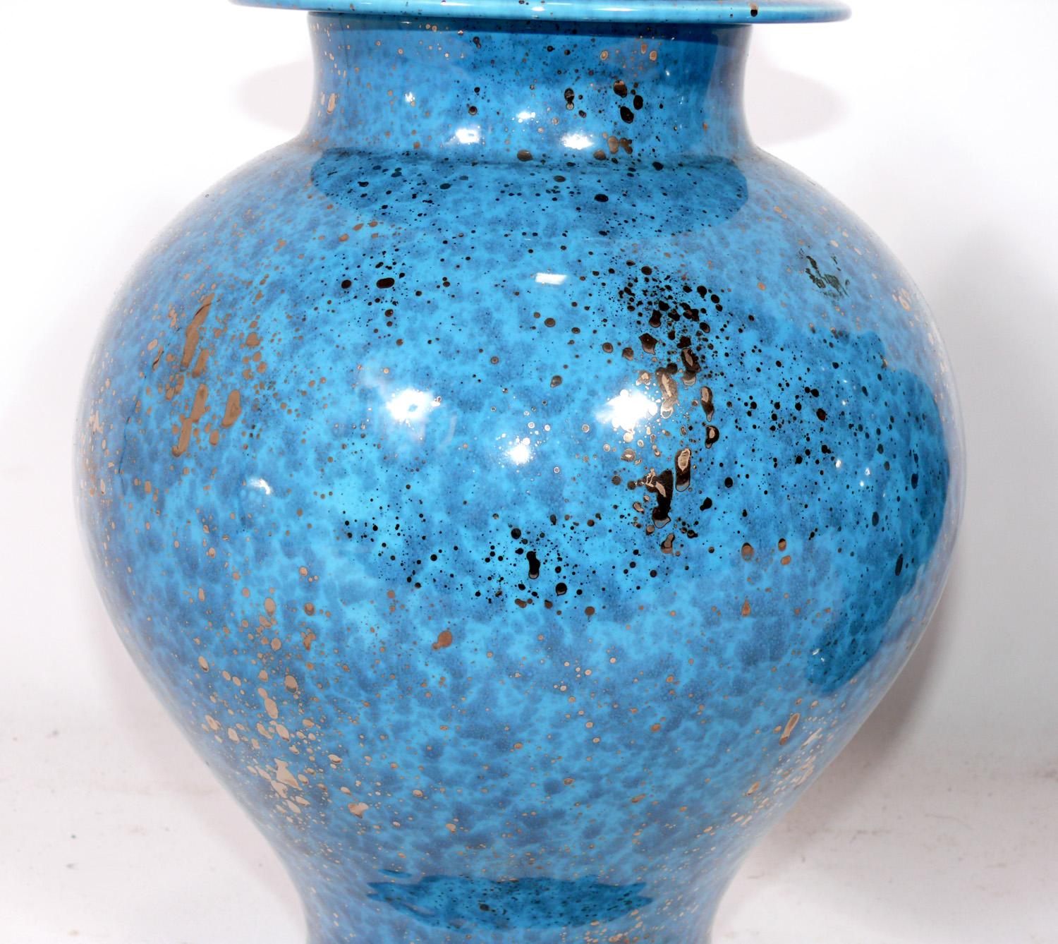 Pair of vibrant blue christian dior ceramic ginger jars, France, circa 1970s. Beautiful ginger jar form in a vibrant blue color with silver oil spot decoration.