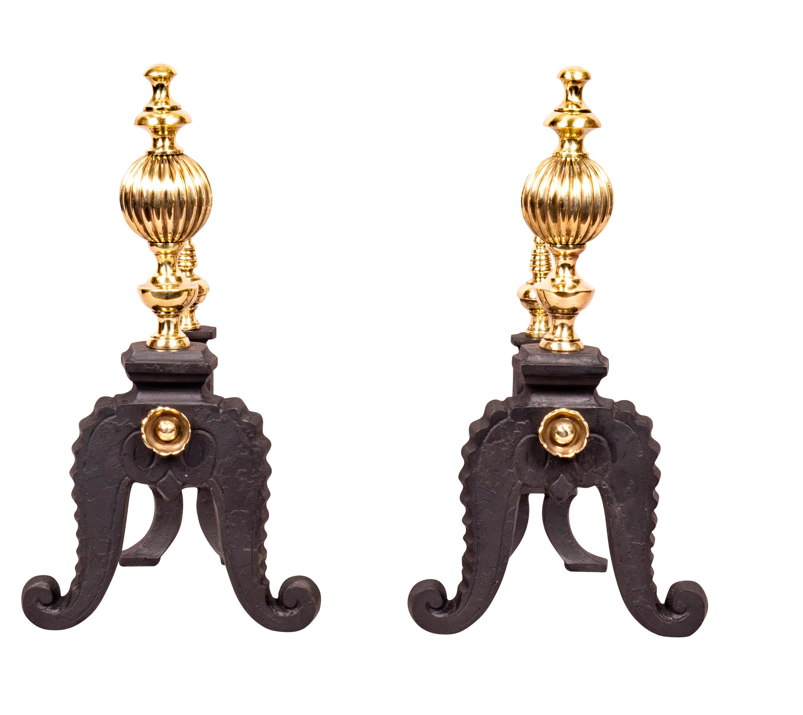 Each with two legs and brass finials, brass tool rest and rear feet and finial.
