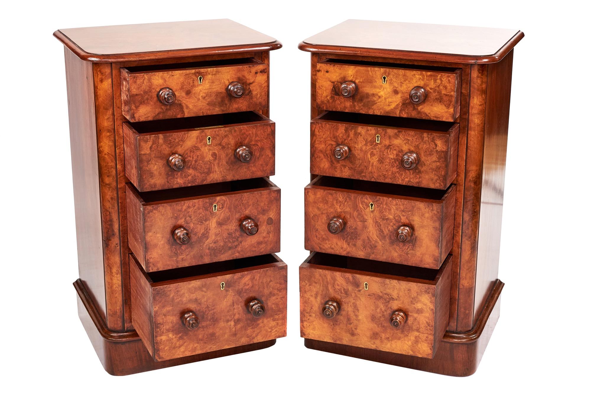 A beautiful pair of Victorian burr walnut antique bedside cupboards/nightstands having very attractive faux drawer fronts and wonderful burr walnut tops. The four faux drawers have turned knobs and original keys which open to reveal a single shelf