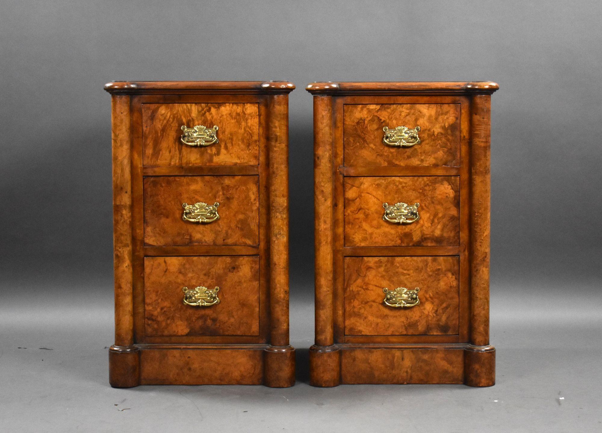 For sale is a Victorian burr walnut bedside chests, having an arrangement of four graduated drawers, each with brass handles, flanked by columns above a plinth base. Both chests remain in good condition, showing minor signs of wear commensurate with