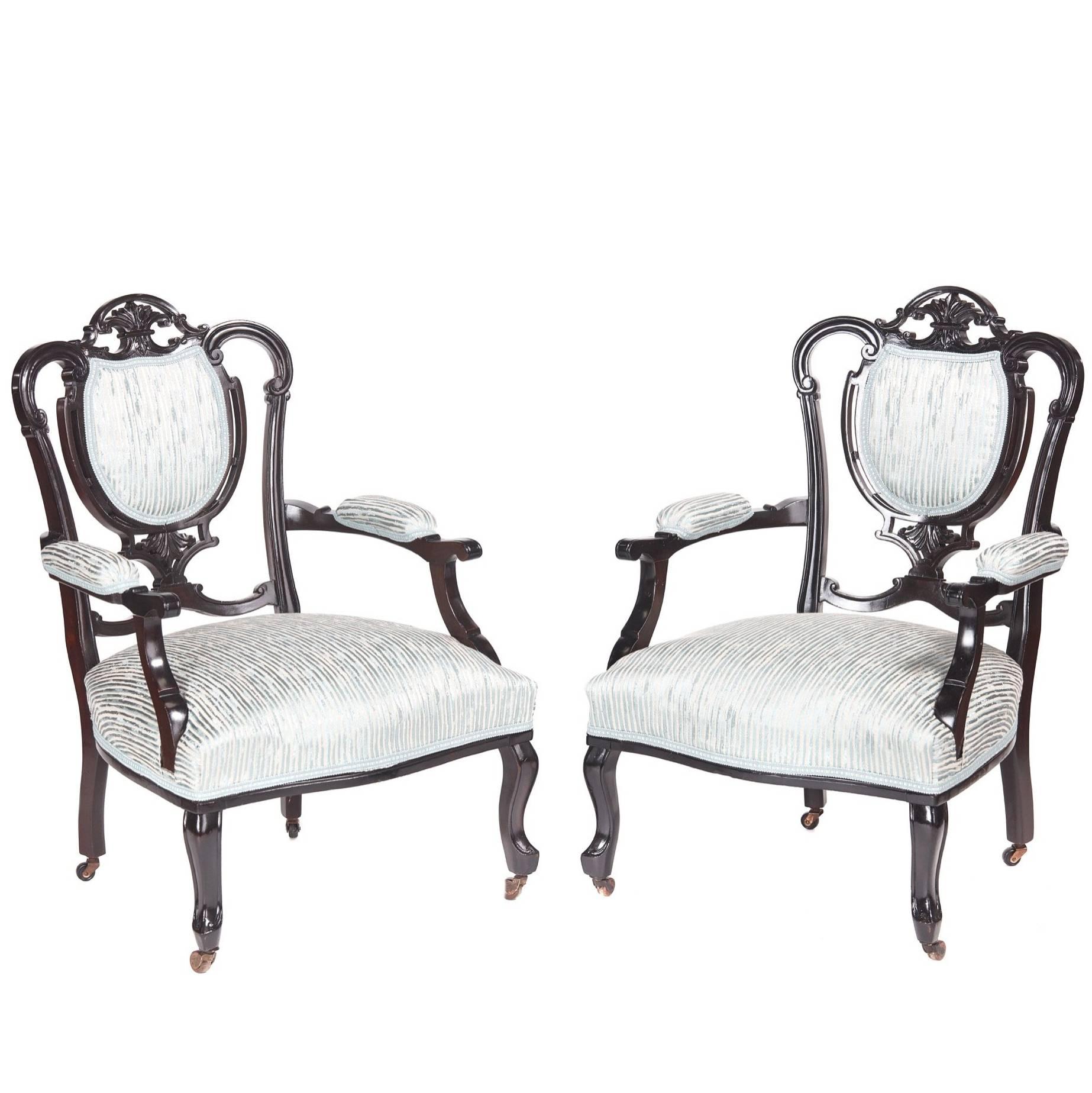 Pair of Victorian Carved Black Lacquered Library Chairs For Sale