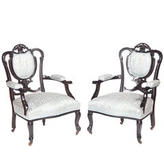 Pair of Victorian Carved Black Lacquered Library Chairs