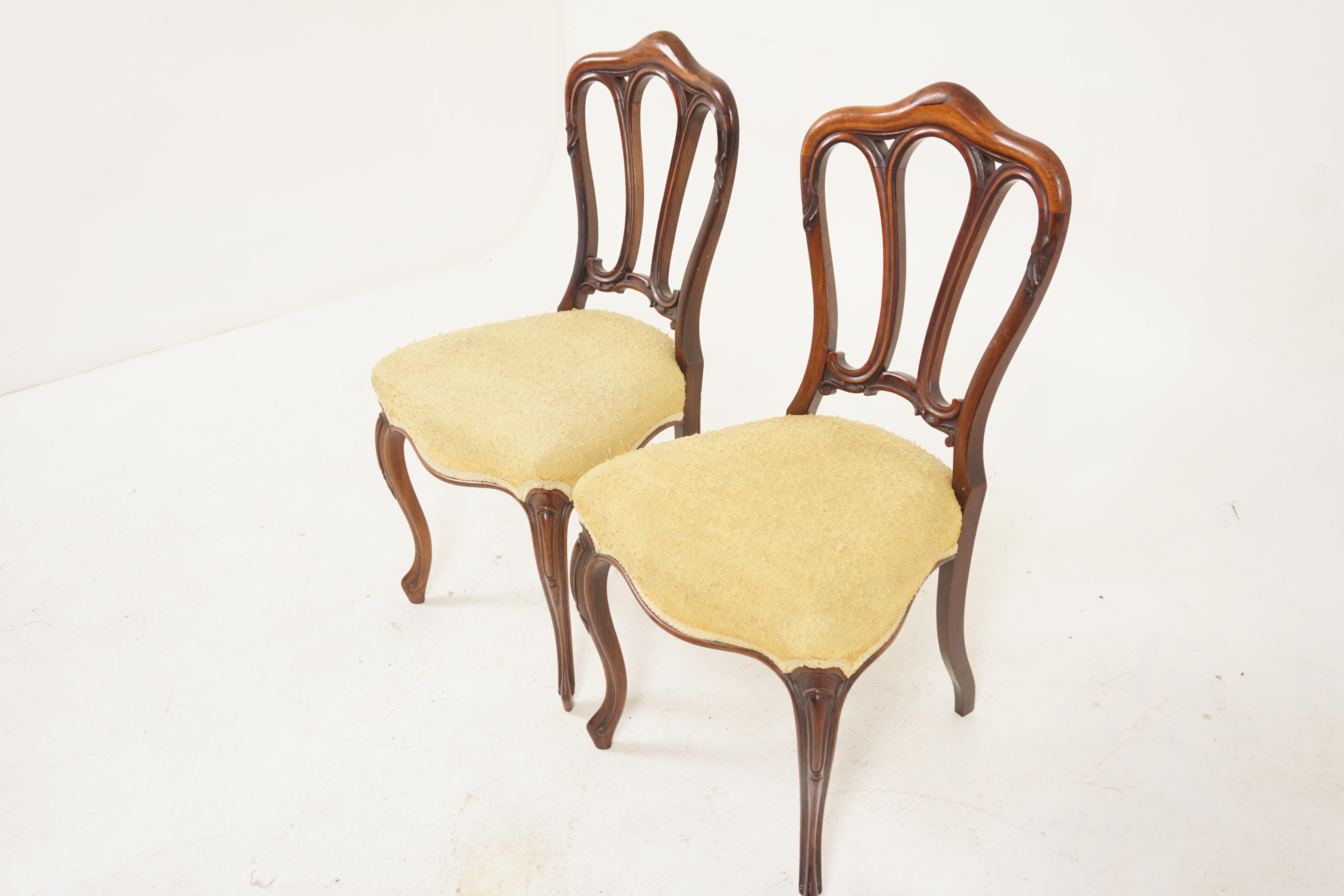 Pair of Victorian Carved Rosewood Occasional Chairs, Scotland 1860, H1165

Scotland 1860
Solid Rosewood
Original finish
The chairs have pierced, shaped and carved backs
Large upholstered overstuffed seats
All standing on cabriole supports
All joints