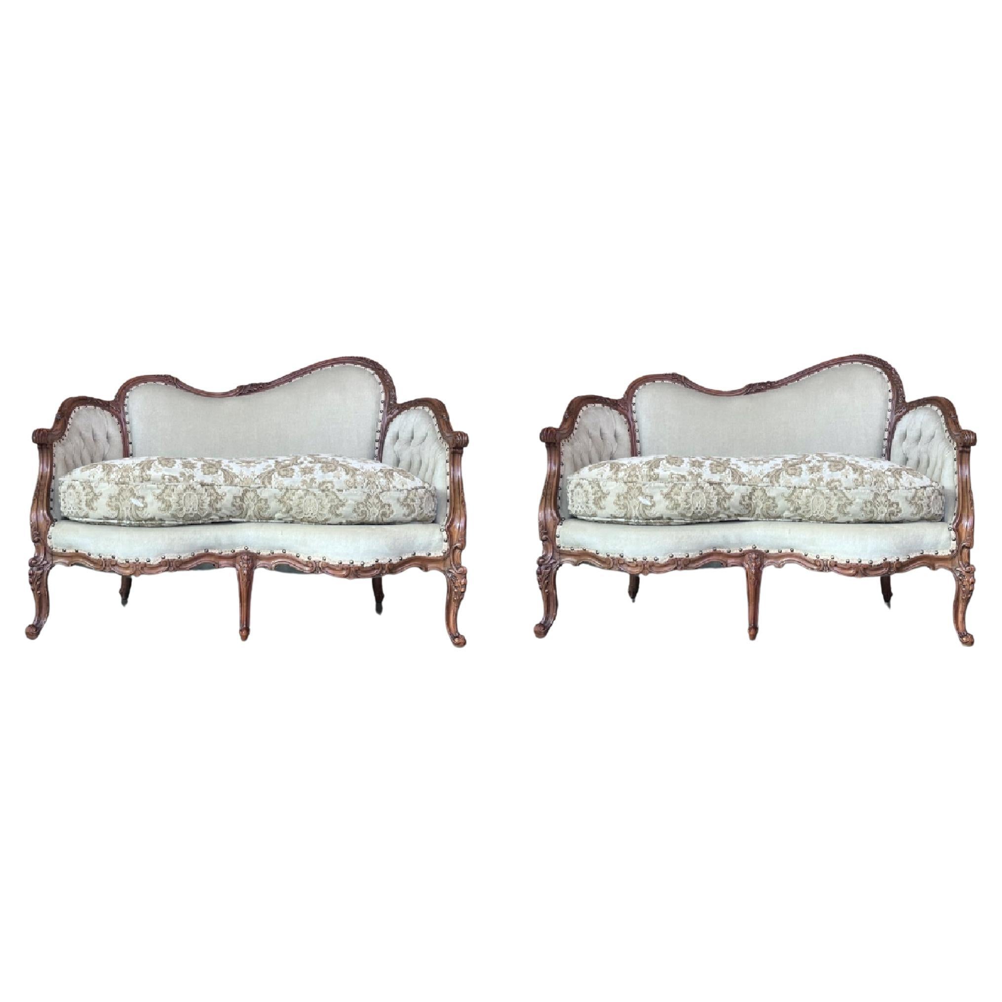 Pair of Victorian Carved Walnut Button Back Sofa, Circa 1890