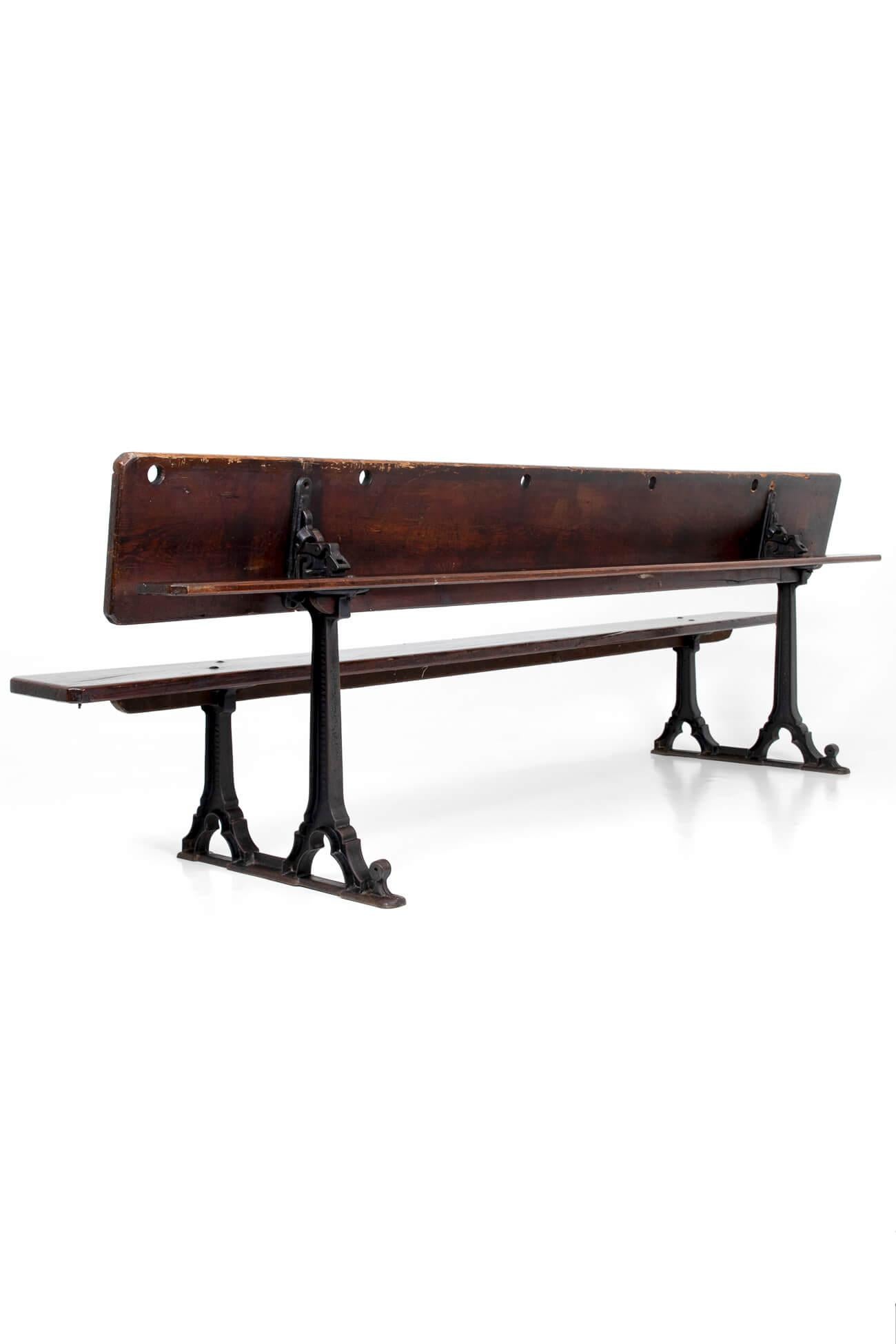 A wonderful pair of Victorian gothic metamorphic chapel benches or school benches. This particular pair had been in situ since 1860 until recently being discovered in a school in the South East of England.
The benches have cast iron legs and