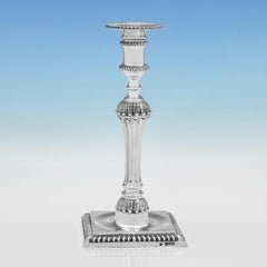 Pair of Victorian cast sterling silver candlesticks made in London in 1898