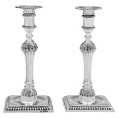 Pair of Victorian cast sterling silver candlesticks made in London in 1898