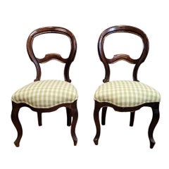 Pair of Victorian chairs upholstered in green gingham fabric