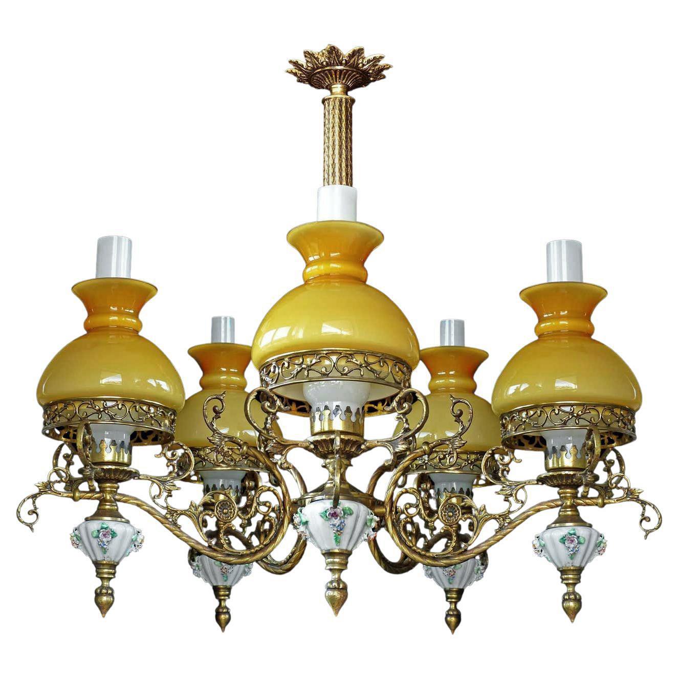 Gorgeous antique pair circa 1920 French Victorian floral encrusted porcelain five-light bulbs chandelier/bronze and opaline amber glass shades
Porcelain/opaline amber cased glass/chiseled gilt bronze/ brass
Five-light bulbs e 14 /good working