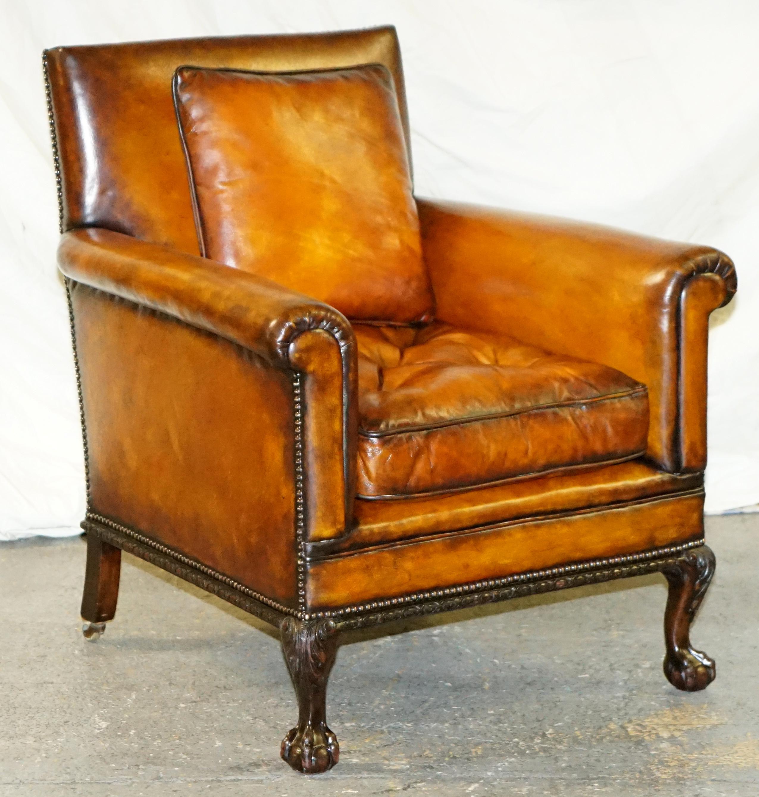 We are delighted to offer for sale this stunning and original pair of circa 1860 club armchairs with hand carved claw & ball feet and brown leather upholstery

A very original and good looking pair, it is rare to find club armchairs from this