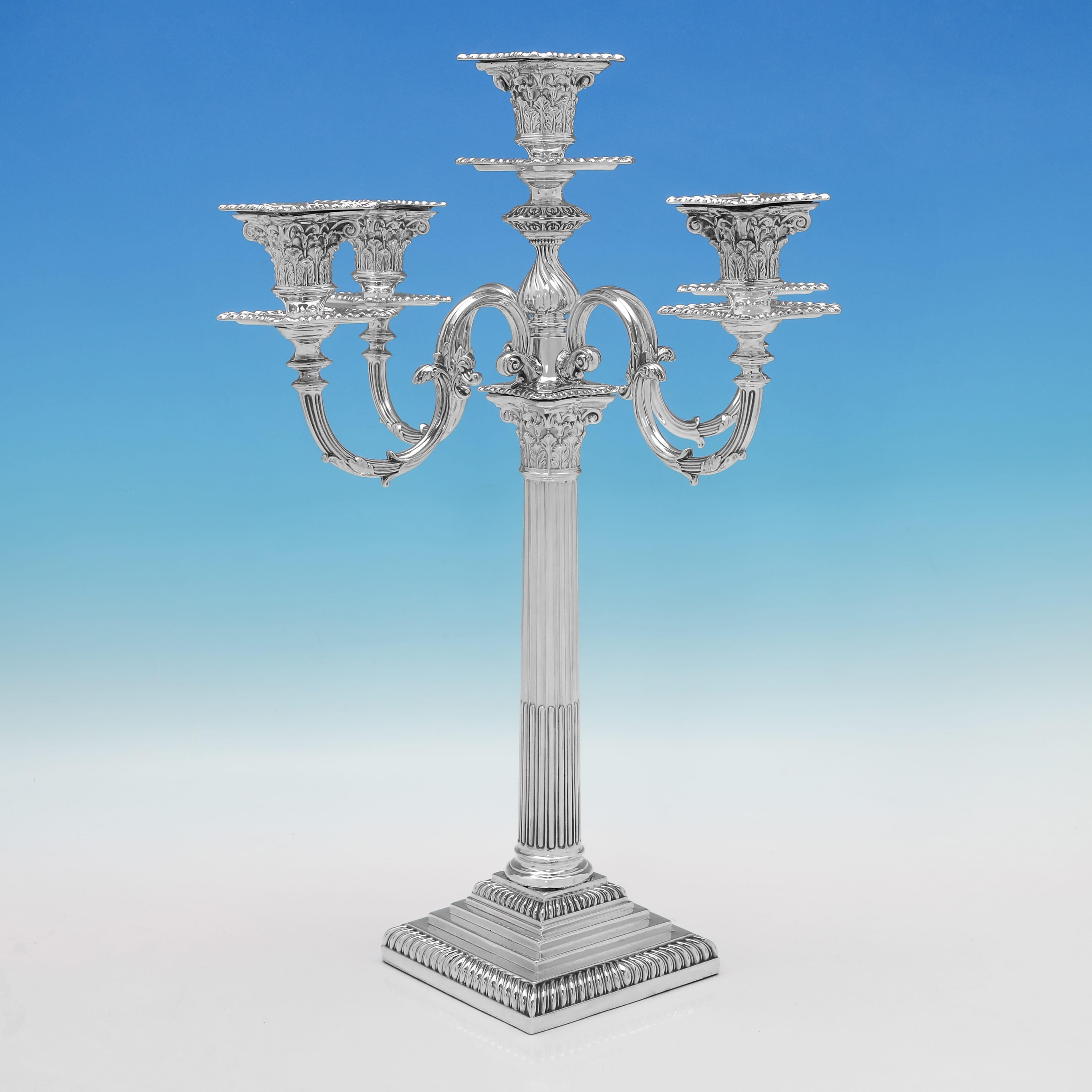 Hallmarked in Sheffield in 1892 by James Kebberling Bembridge, this handsome pair of Antique, Victorian Sterling Silver Candelabra, are in the corinthian column style, with stepped bases, removable nozzles and gadroon borders. Each candelabrum
