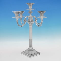 Pair of Victorian corinthian column candelabra made in 1892