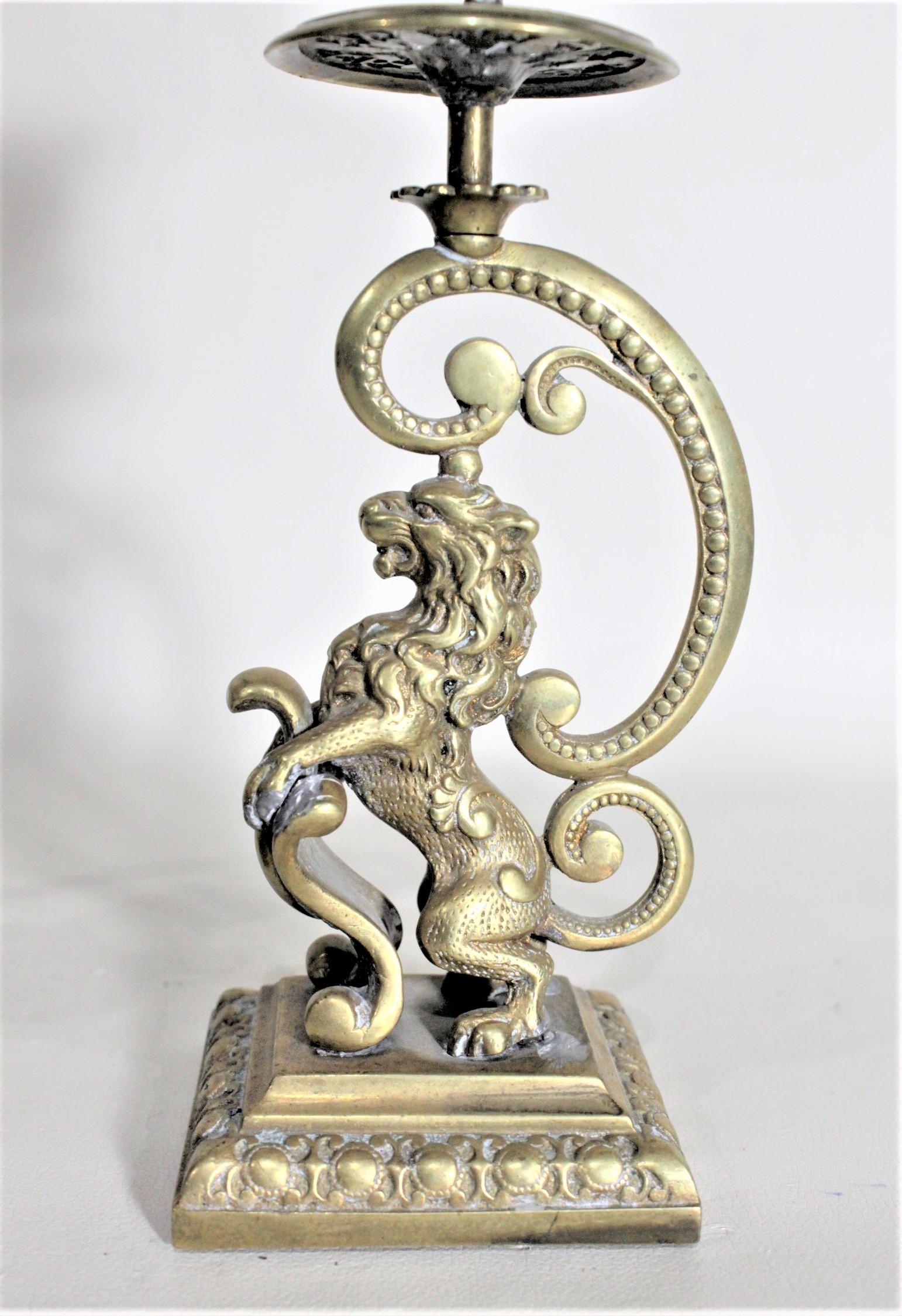Pair of Victorian English Cast Brass Candlesticks with Rearing Figural Lions For Sale 2