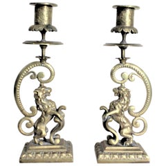 Pair of Victorian English Cast Brass Candlesticks with Rearing Figural Lions