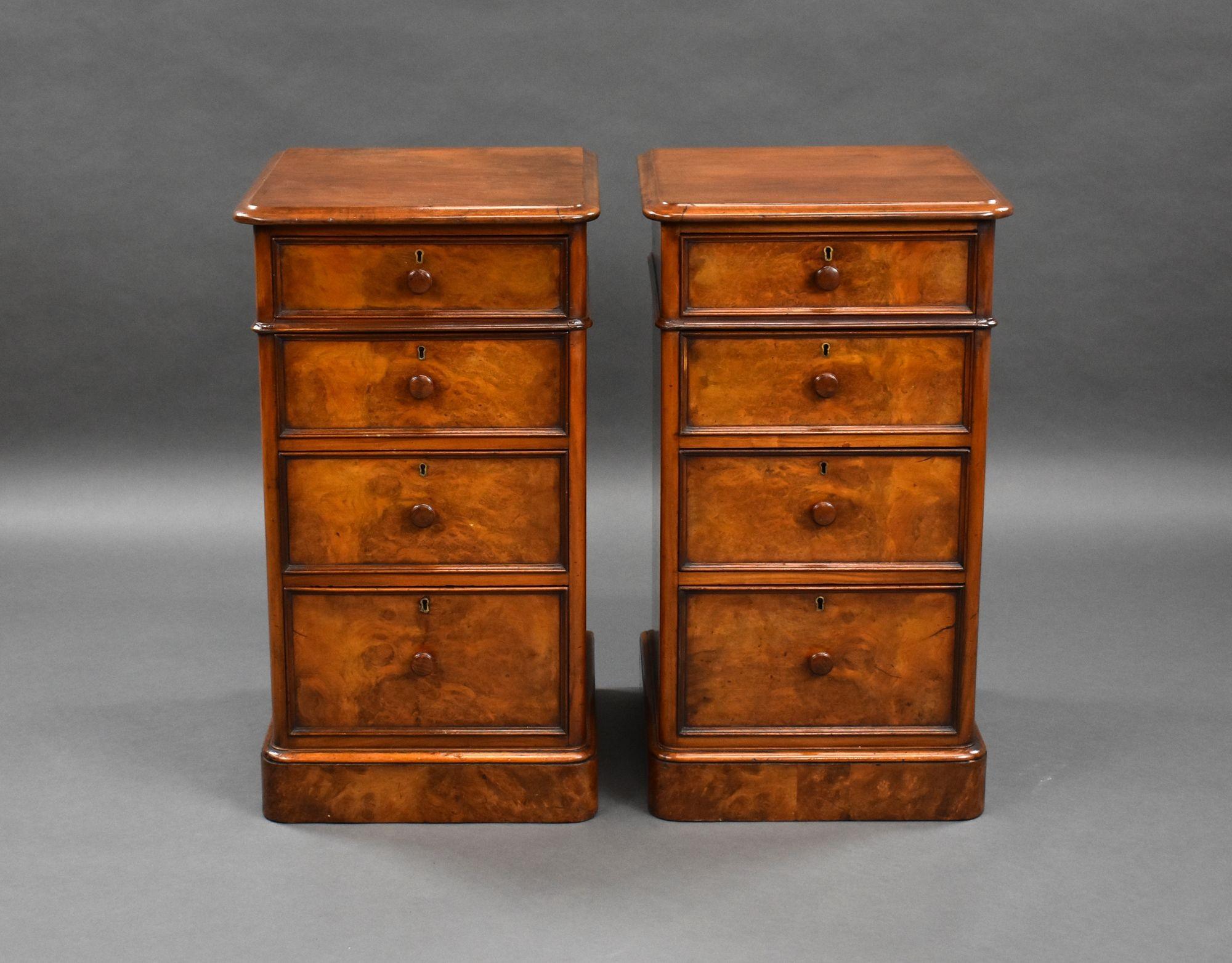 For sale is a good quality [pair of Victorian figured walnut bedside chests of drawers, each chest having an arrangement of four drawers, each with turned handles, both chests stand are raised on a plinth base and are in very good condition for