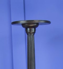 Pair of Victorian Fluted Mahogany Torcheres with Ball and Claw Tripod Feet