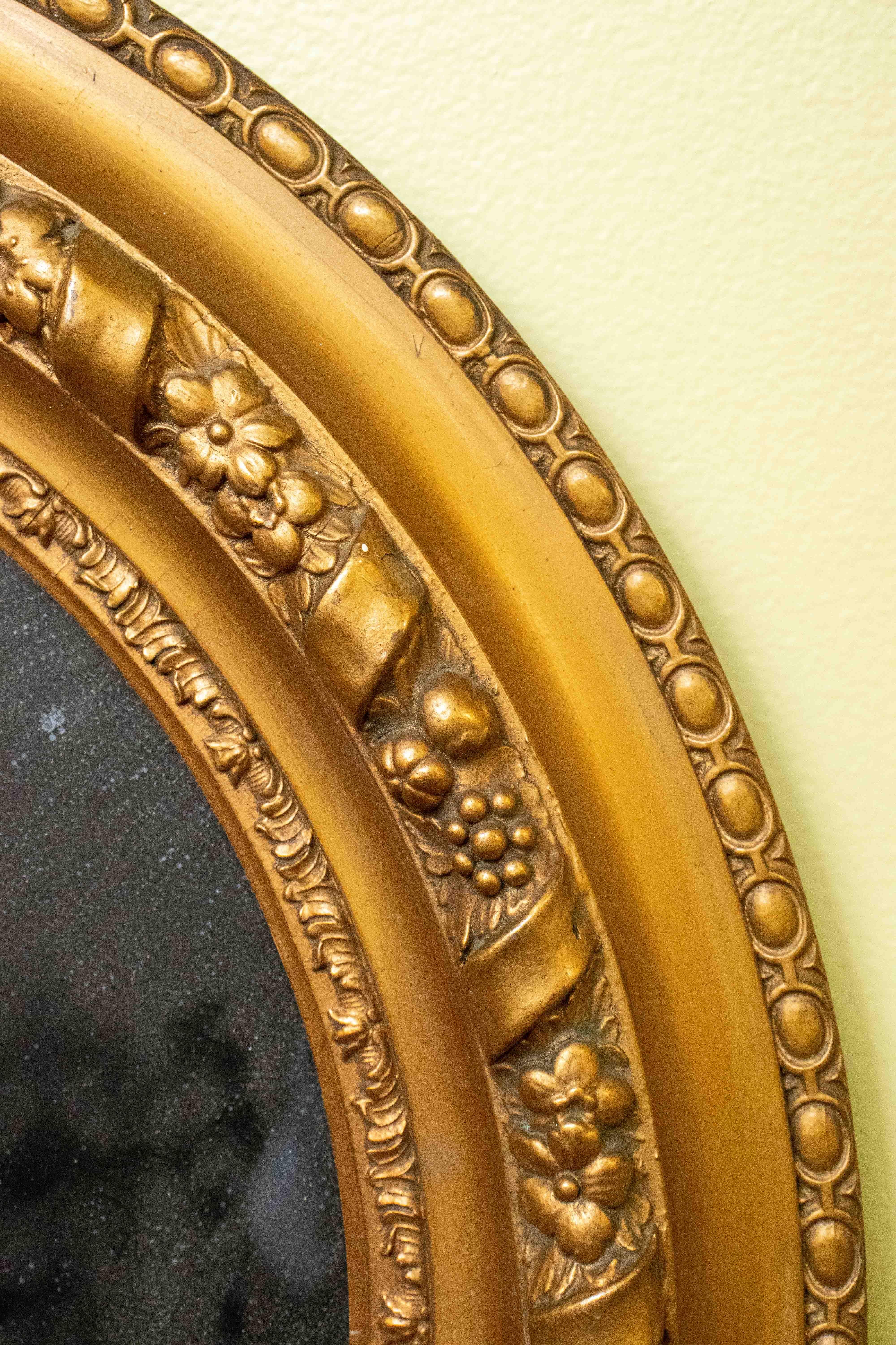 English Pair of Victorian Gilded Oval Mirrors