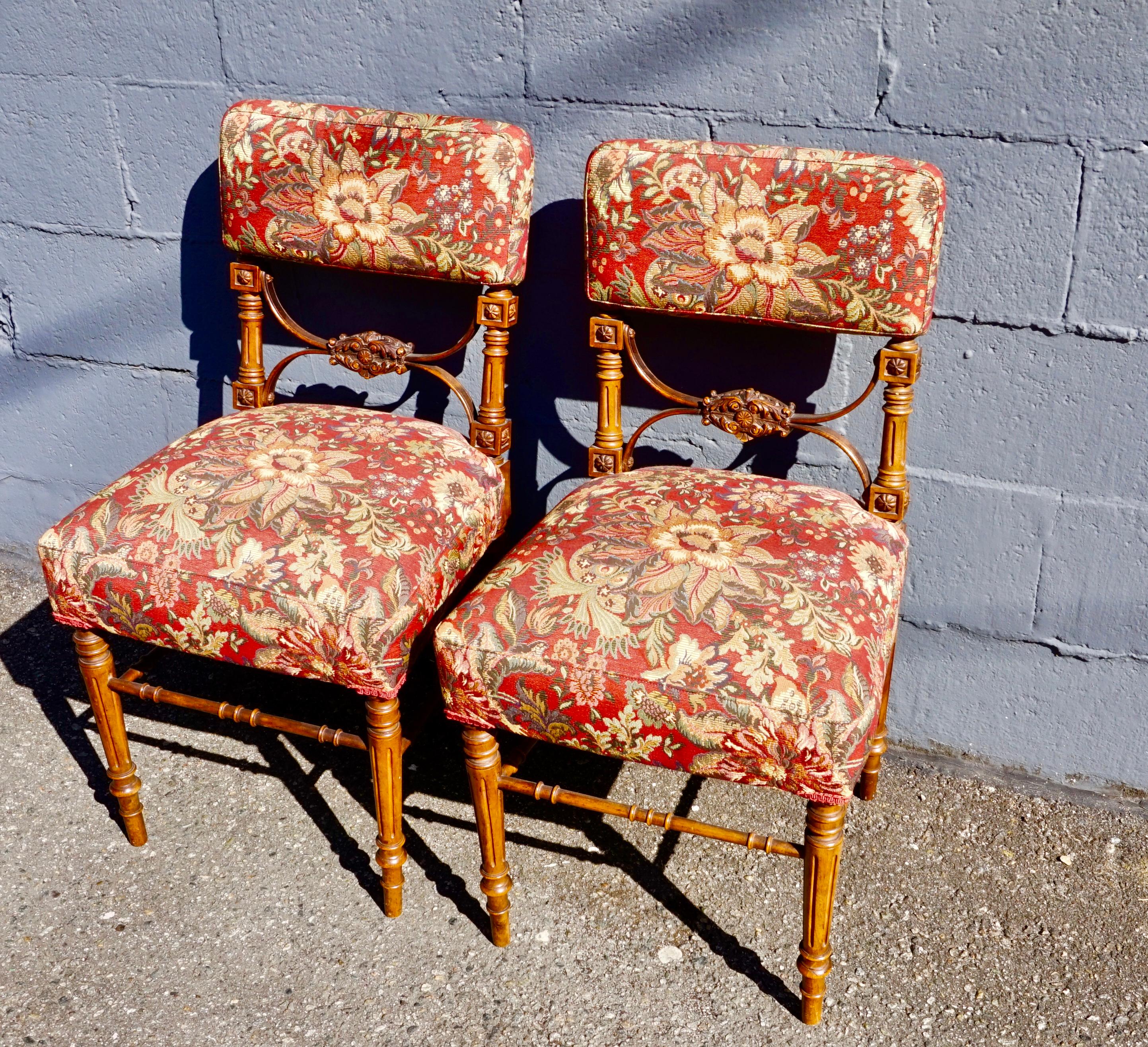 English Pair of Victorian Gothic Hand Carved Fine Mahogany Chairs in Floral Fabric