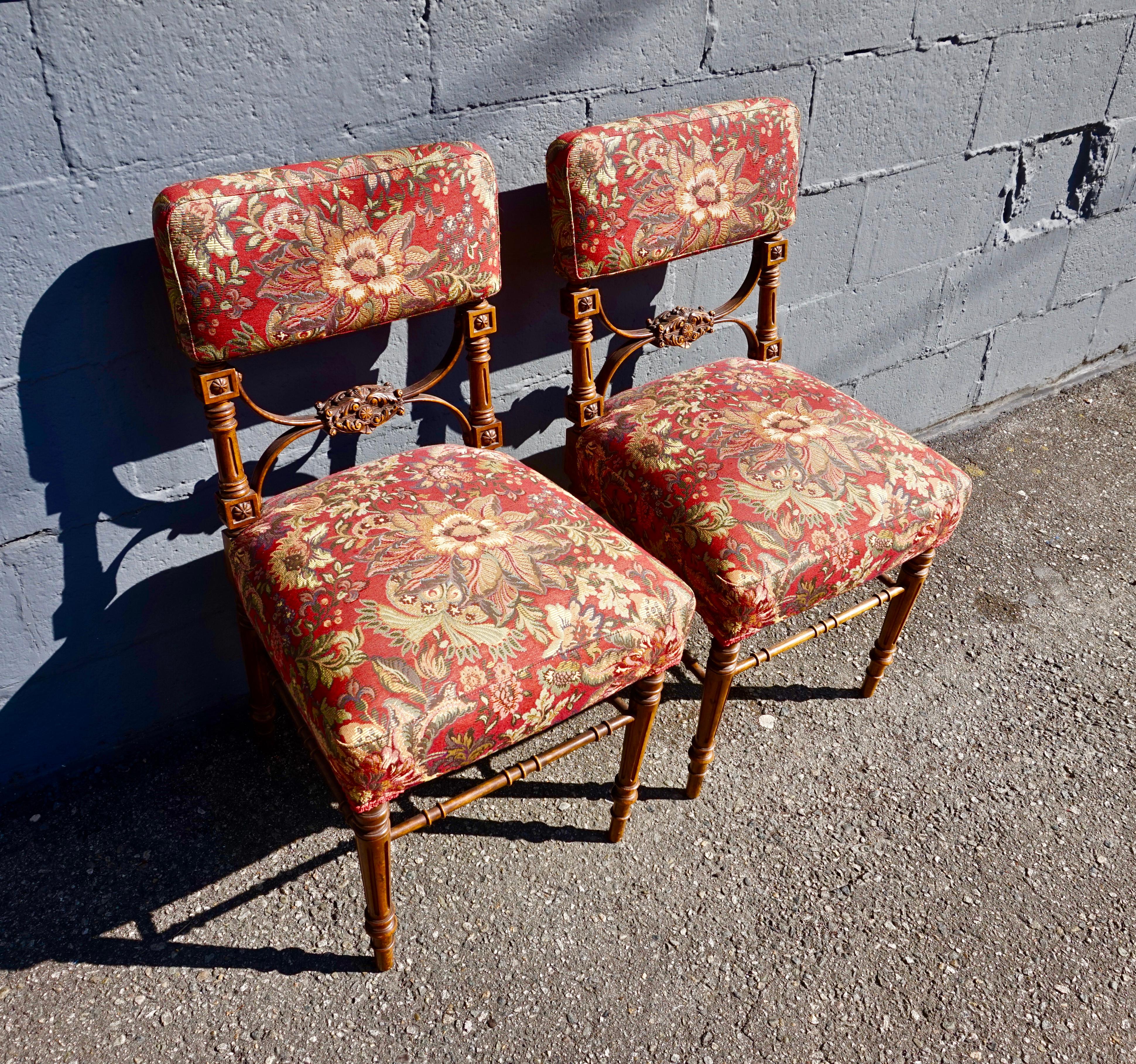 Hand-Carved Pair of Victorian Gothic Hand Carved Fine Mahogany Chairs in Floral Fabric
