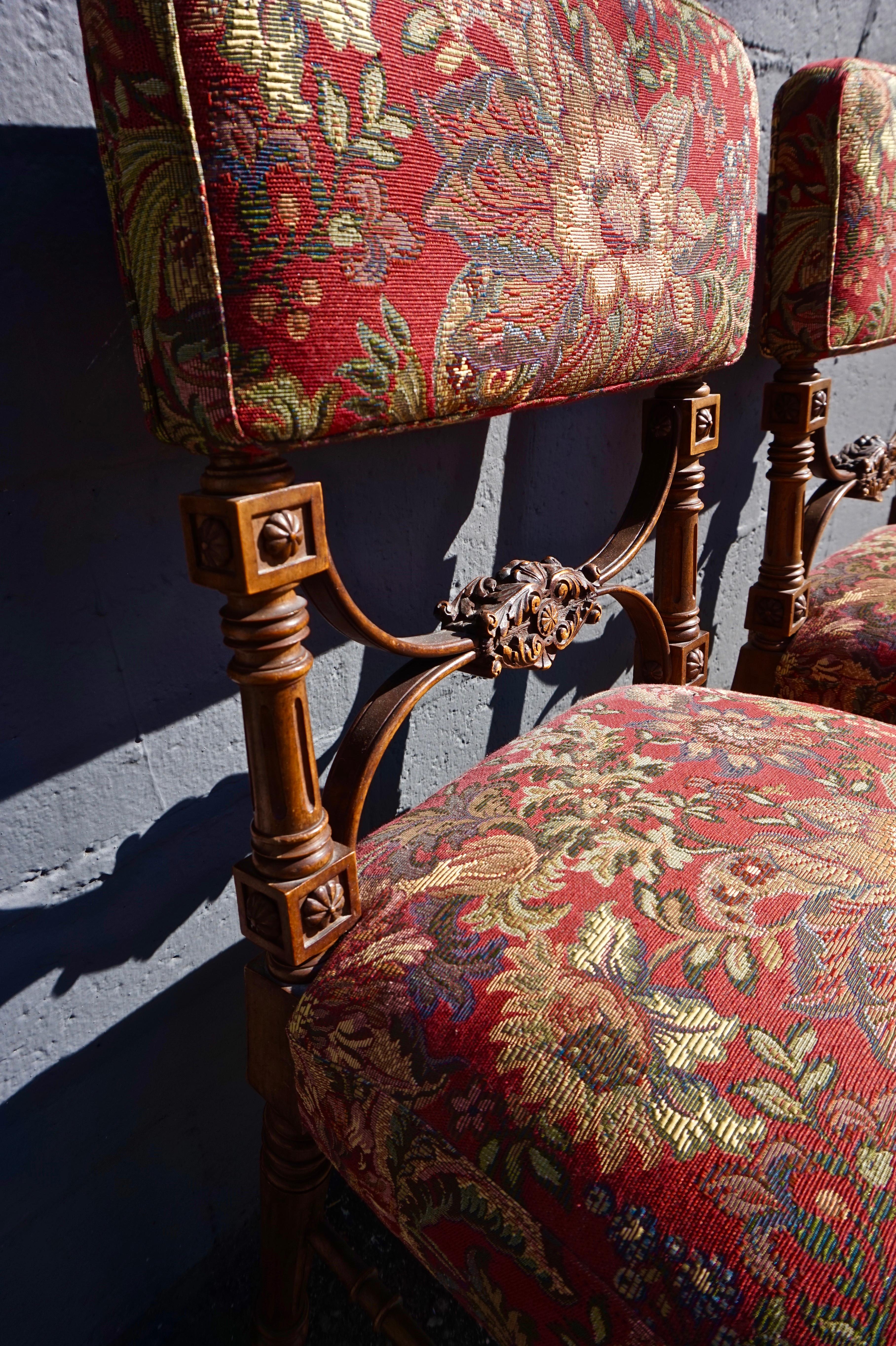 Late 19th Century Pair of Victorian Gothic Hand Carved Fine Mahogany Chairs in Floral Fabric