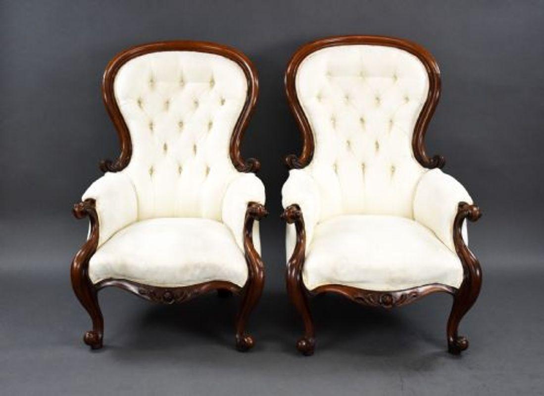 For sale is a good quality matched pair of Victorian mahogany armchairs. Both frames are in very good condition for their age, the upholstery is a bit tired and would benefit from cleaning.

Width: 71cm, depth: 88cm, height: 104cm.
Width: 71cm,