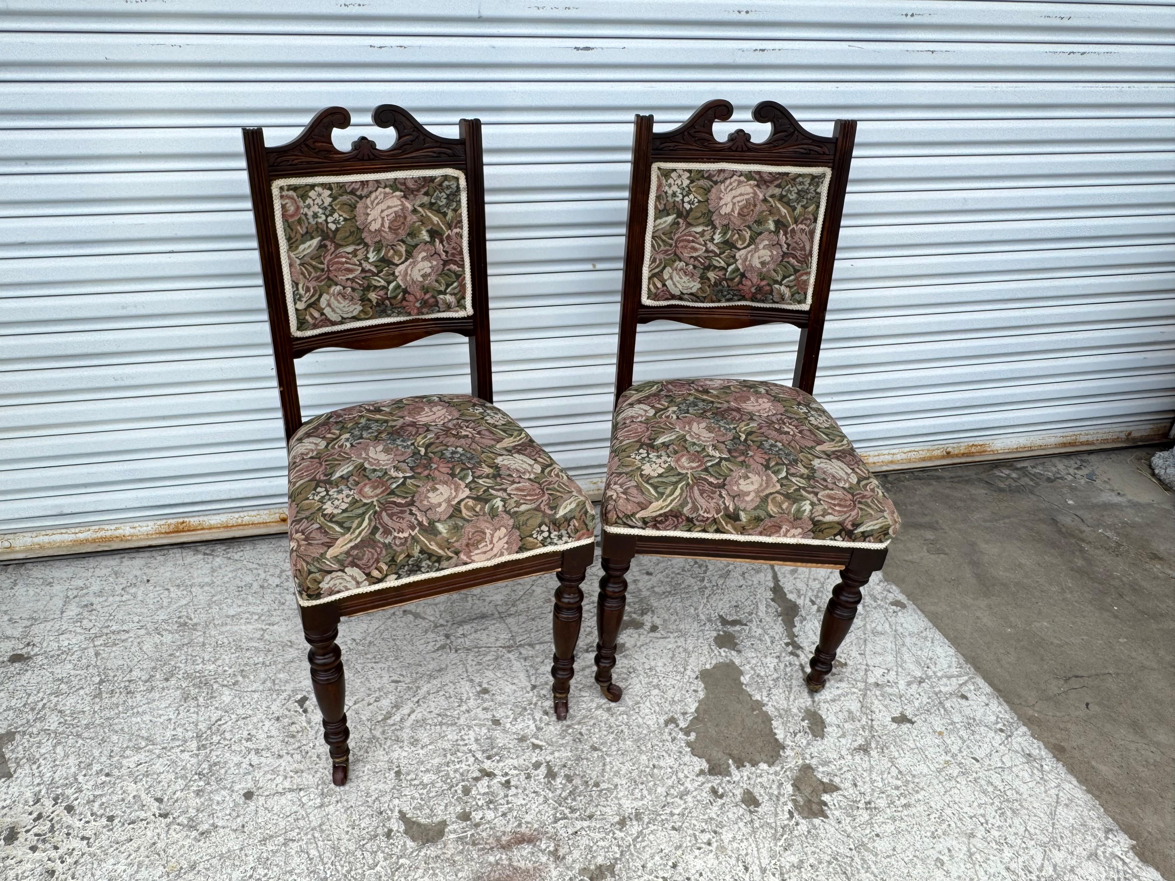 Antique Victorian Parlor chairs with casters on front legs.
They're upholstered in a beautiful needlepoint fabric.
﻿19.5 x 18 x 38
Sh:16
