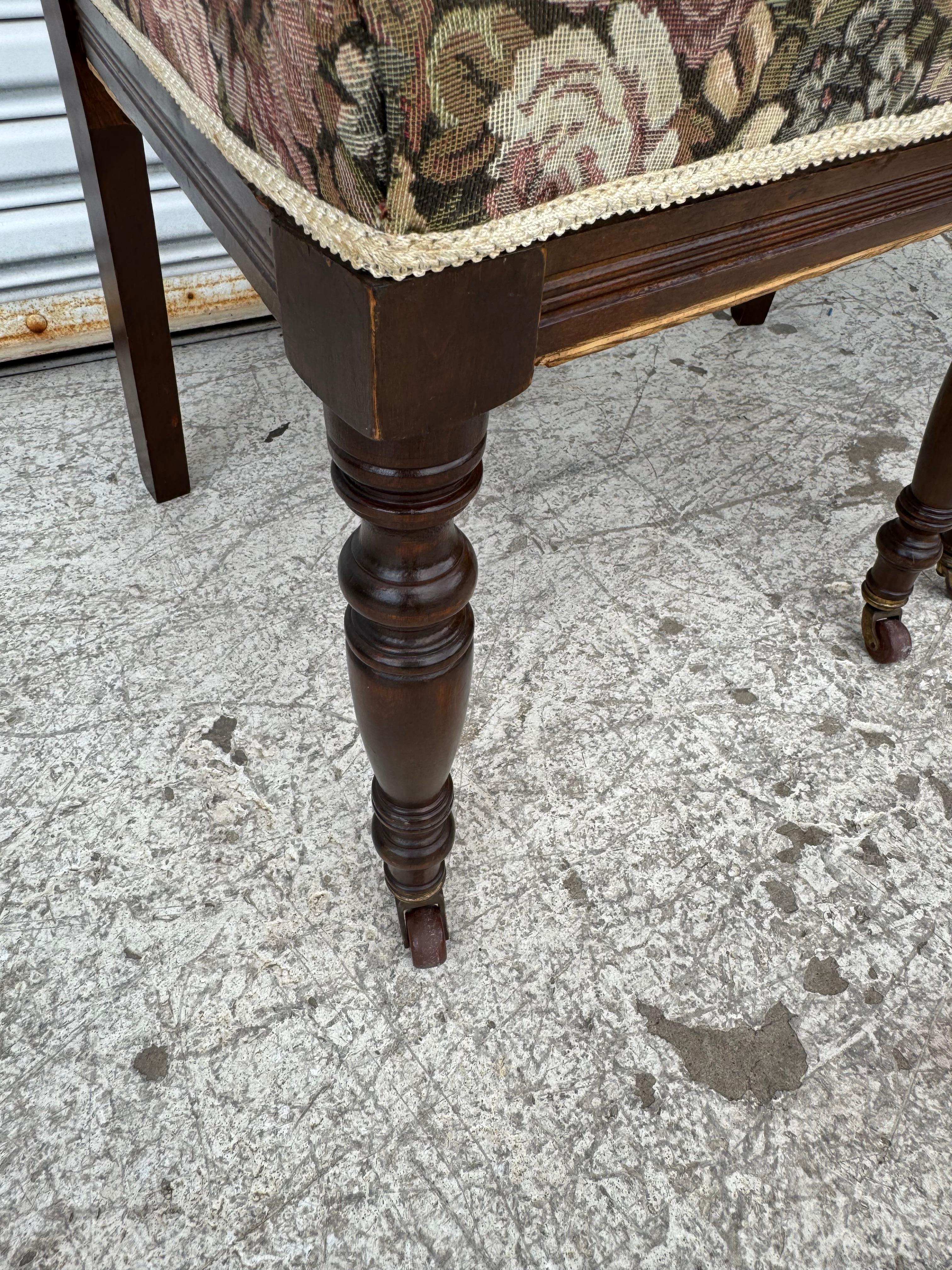 Pair of Victorian Parlor chairs with casters on front legs In Good Condition For Sale In Pasadena, TX