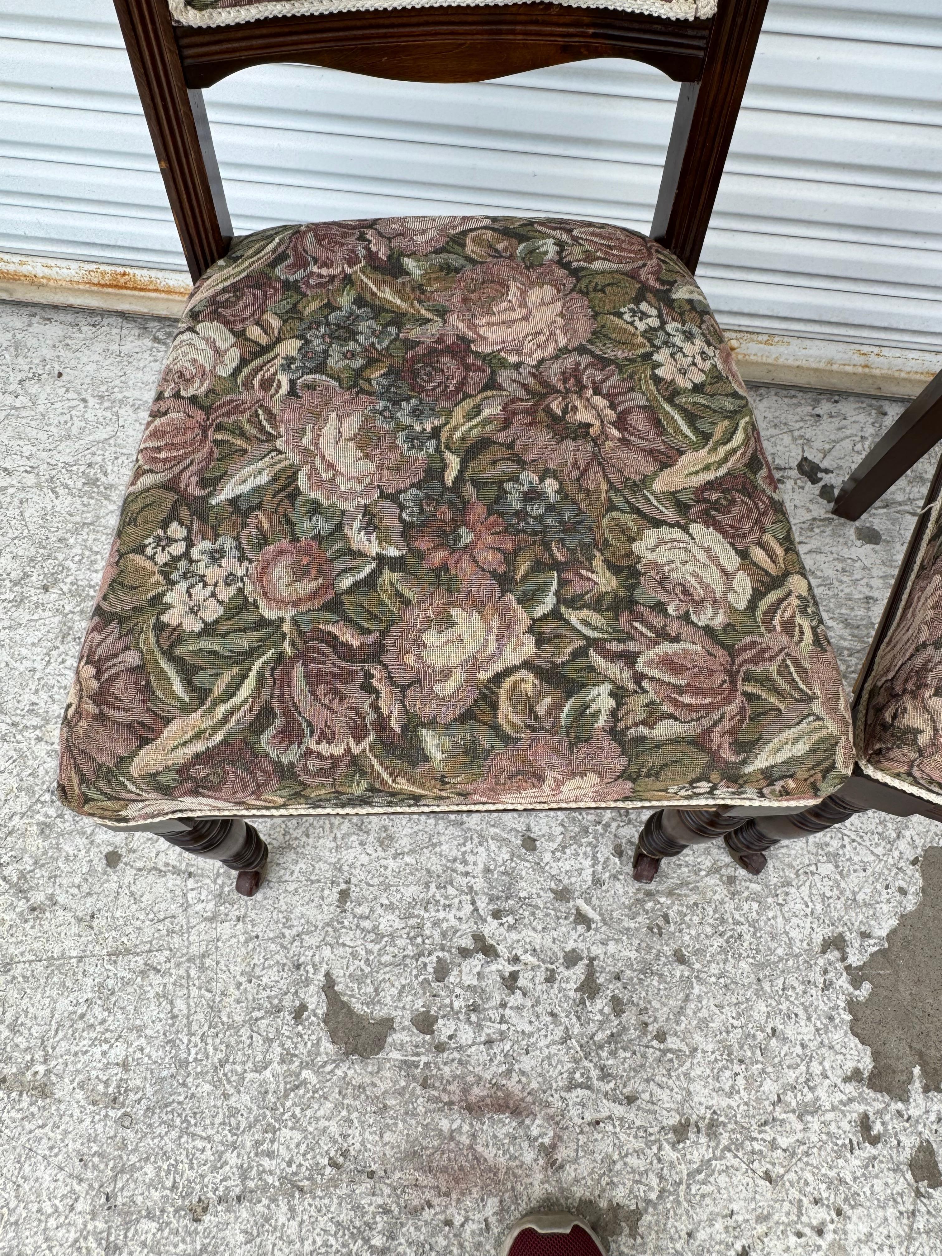Pair of Victorian Parlor chairs with casters on front legs For Sale 1