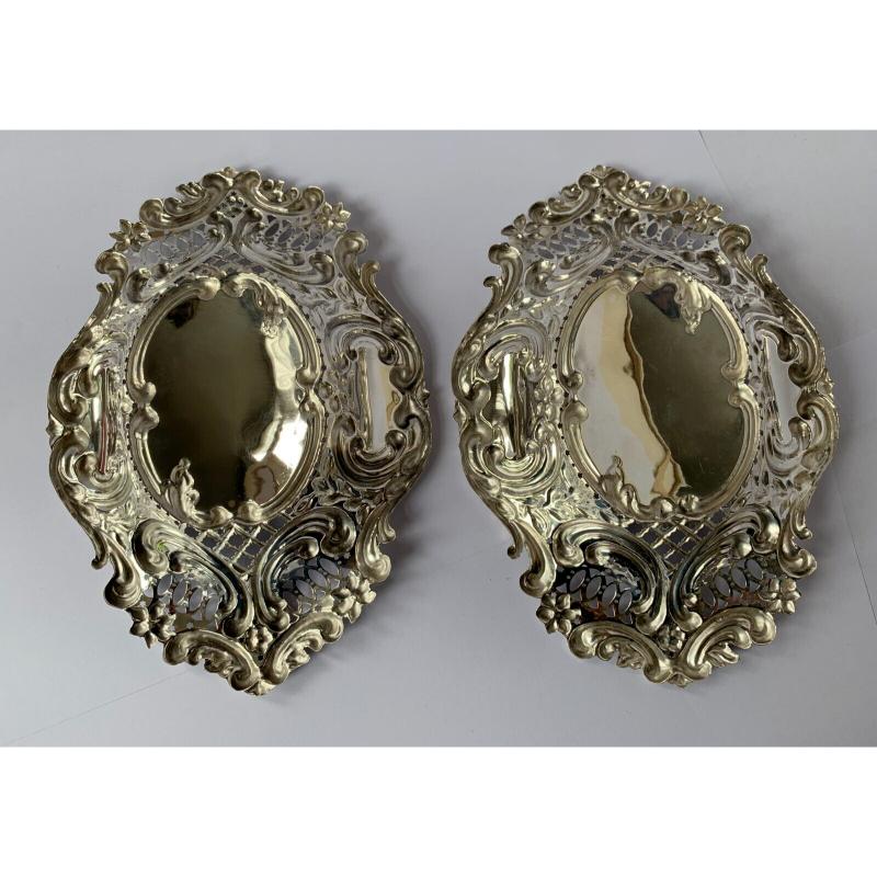 Pair of Victorian Oval Pierced Sterling Silver Bonbon Dishes
In good vintage condition, this is a beautiful pair of bonbon dishes. They would look lovely on any table filled with sweets, nuts or just as they are. 
Hallmarked: Made by The Alexander