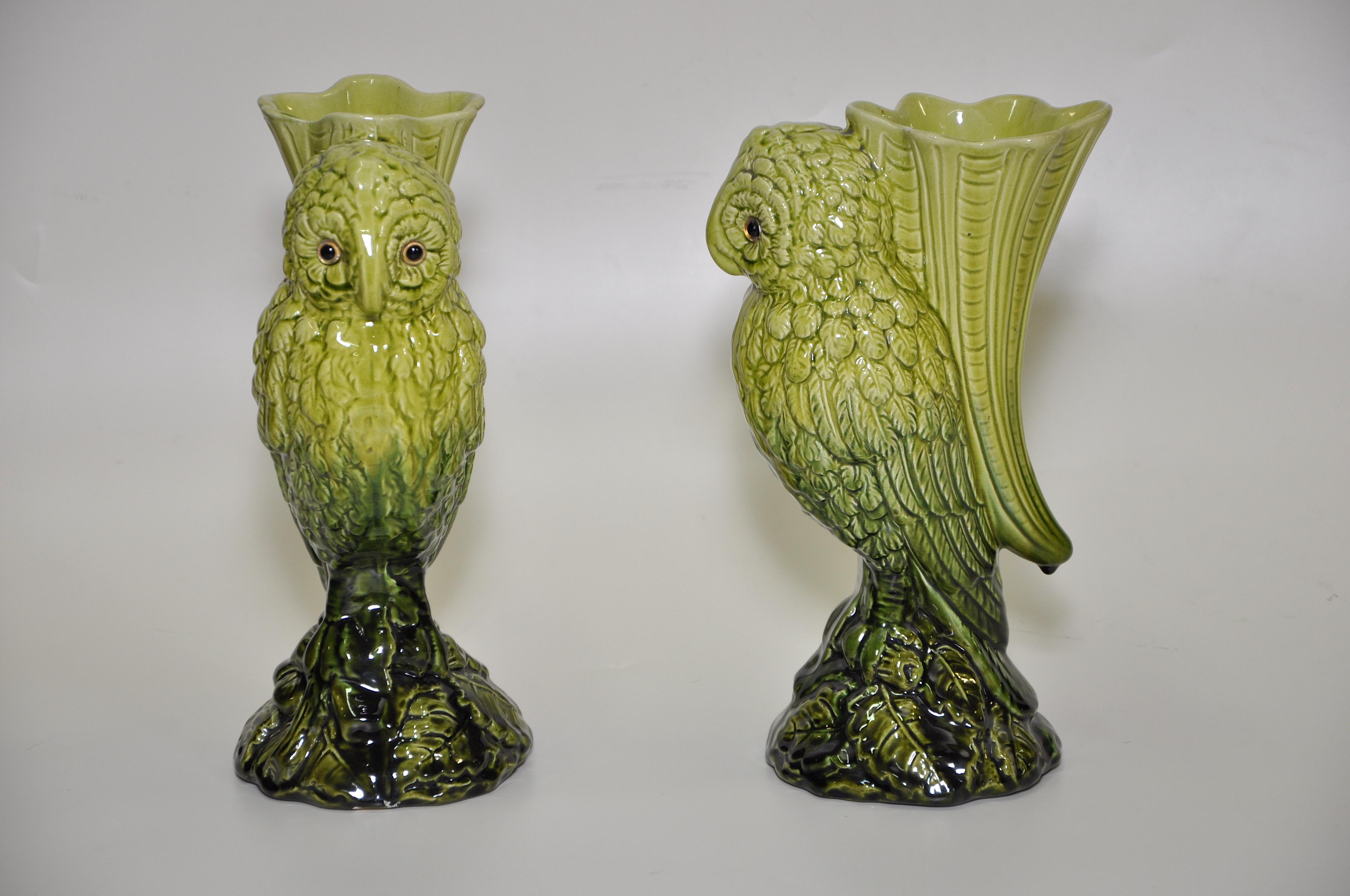 Pair of Victorian pottery vases English European circa 1900 rare ceramic green owls 

Two matching striking vibrant green ceramic pottery vases, would be stunning placed on a mantlepiece above a fire. In a vibrant hue that would work well with