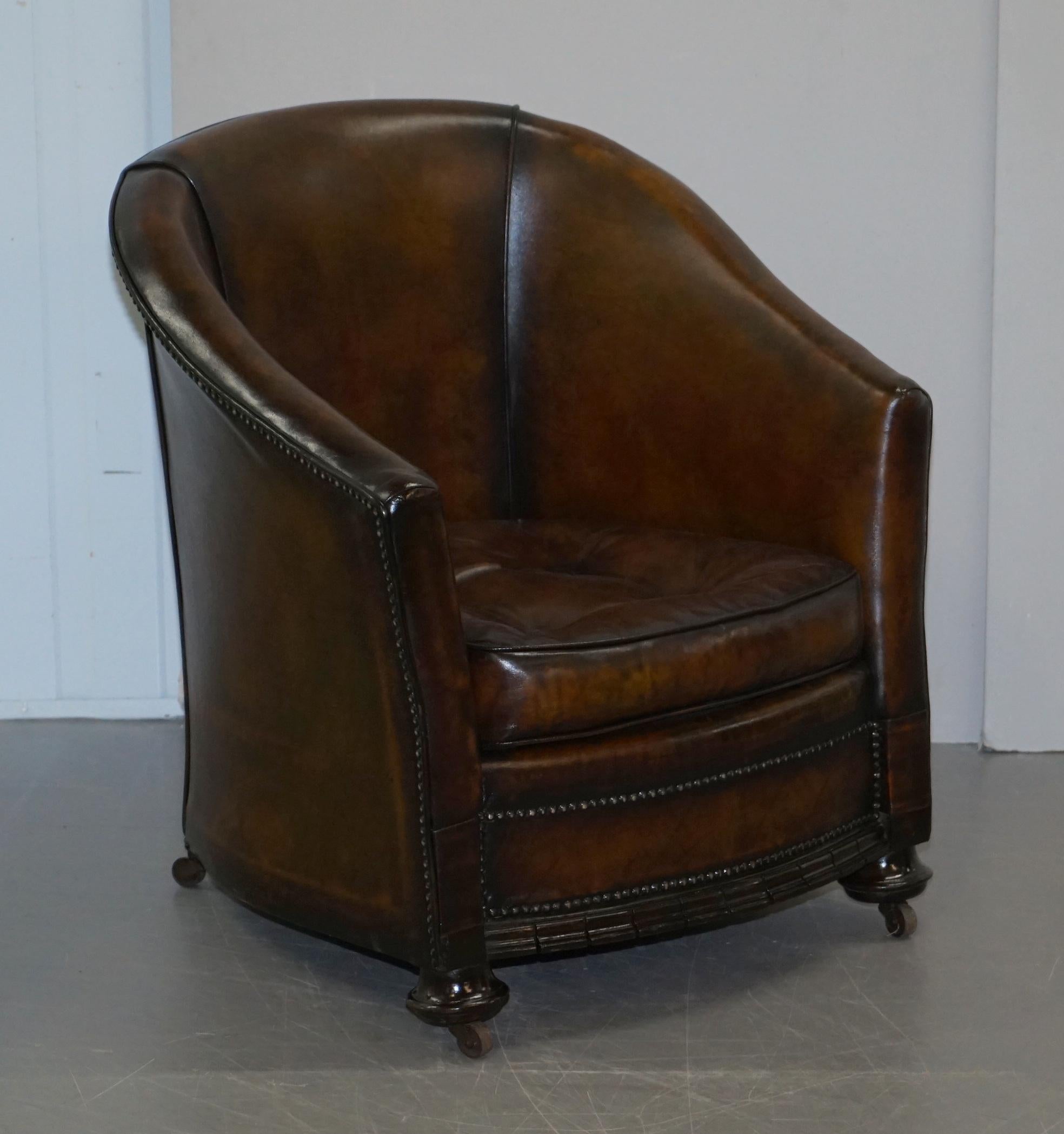 We are delighted to offer for sale this lovely pair of original late Victorian circa 1880-1890 fully restored hand dyed cigar brown leather club or tub armchairs with Thomas Chippendale floating Chesterfield buttoned feather filled cushions

These