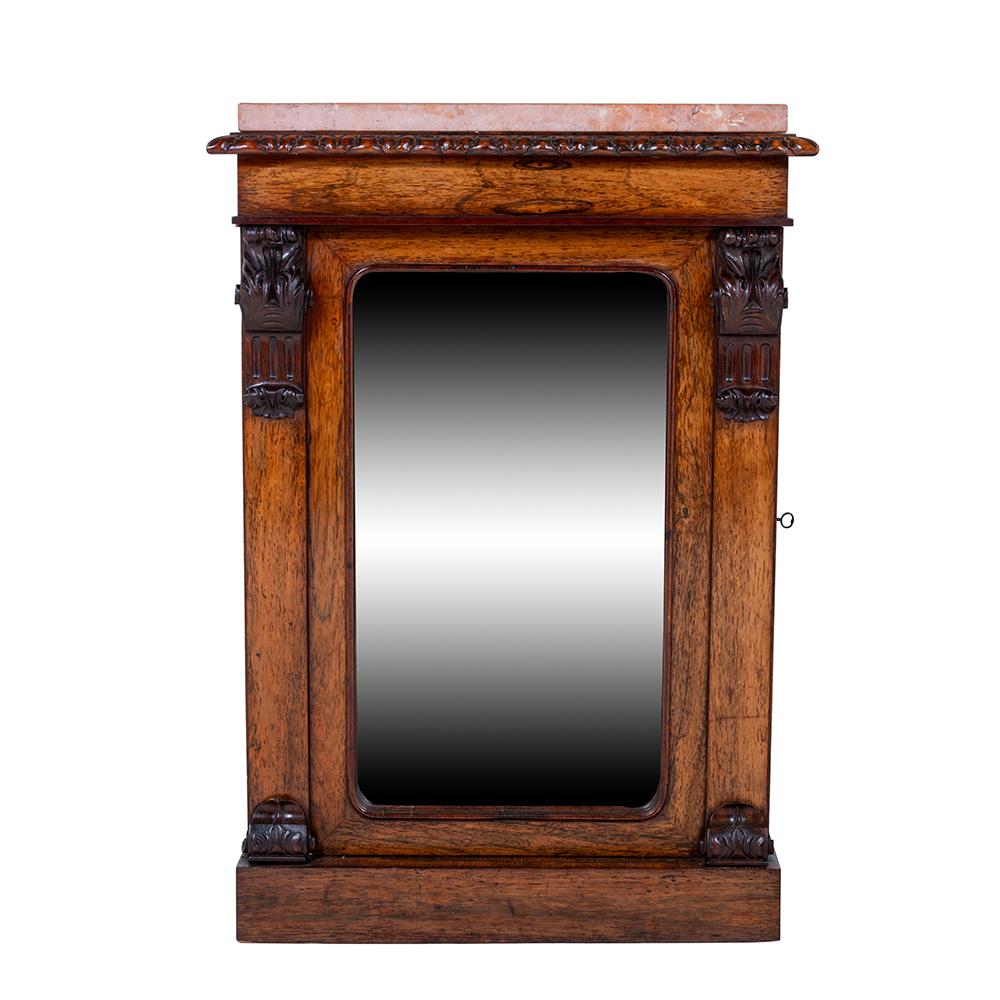 A Pair of Early Victorian Rosewood Side Cabinets by the esteemed firm Johnstone & Jeanes, dating back to the era of 1840. Originating in London, Johnstone & Jeanes became synonymous with unparalleled quality and refined taste during the 19th