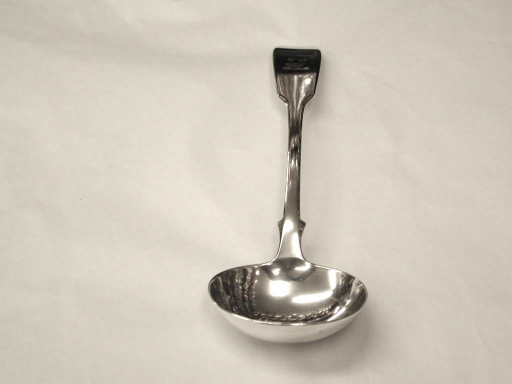Pair of heavy gauge silver sauce ladles in the fiddle pattern, made by William Eaton, in 1843.