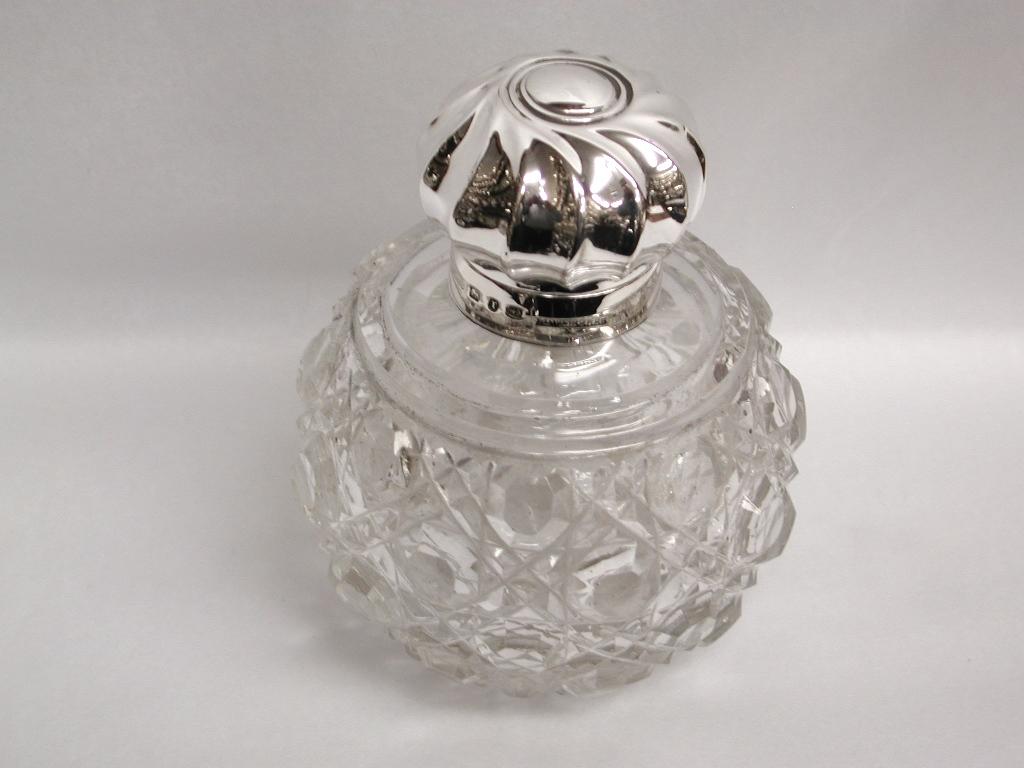 Pair of Victorian silver topped cut glass scent bottles, 1891, J Grinsell & Sons
Lovely matching pair of scent bottles with spiral fluted tops and hand hobnail cut glass.
Made in Birmingham with original glass stoppers.