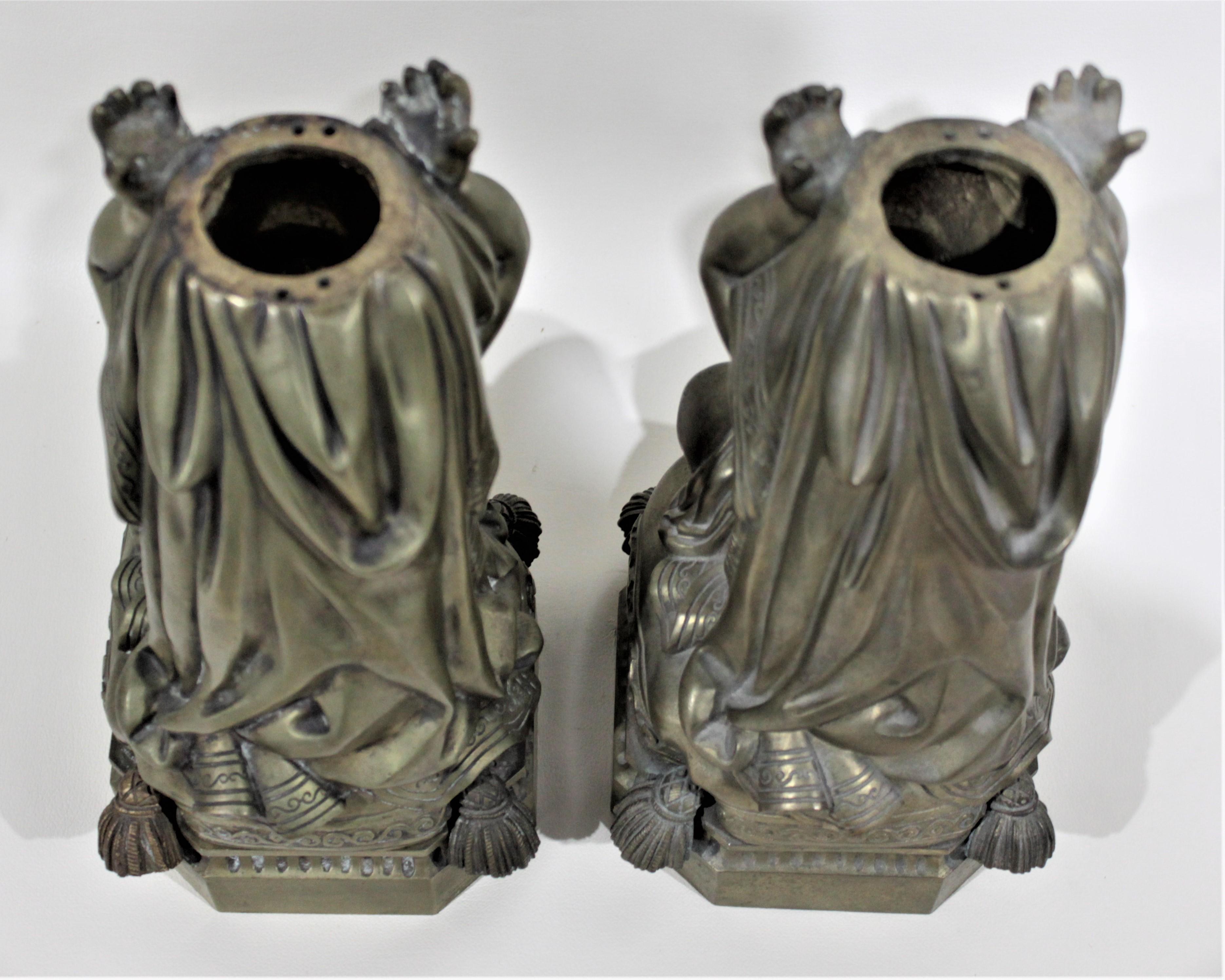 Pair of Victorian Solid Cast Bronze Figural Cherub Oil Lamp Bases Holding Snakes In Good Condition For Sale In Hamilton, Ontario