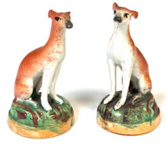 Pair of Victorian Staffordshire Pottery Seated Whippet Figures, Circa 1860