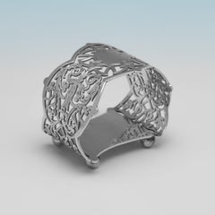 Pareja de servilleteros victorianos de plata de ley fabricados por John Newton Mappin 1889