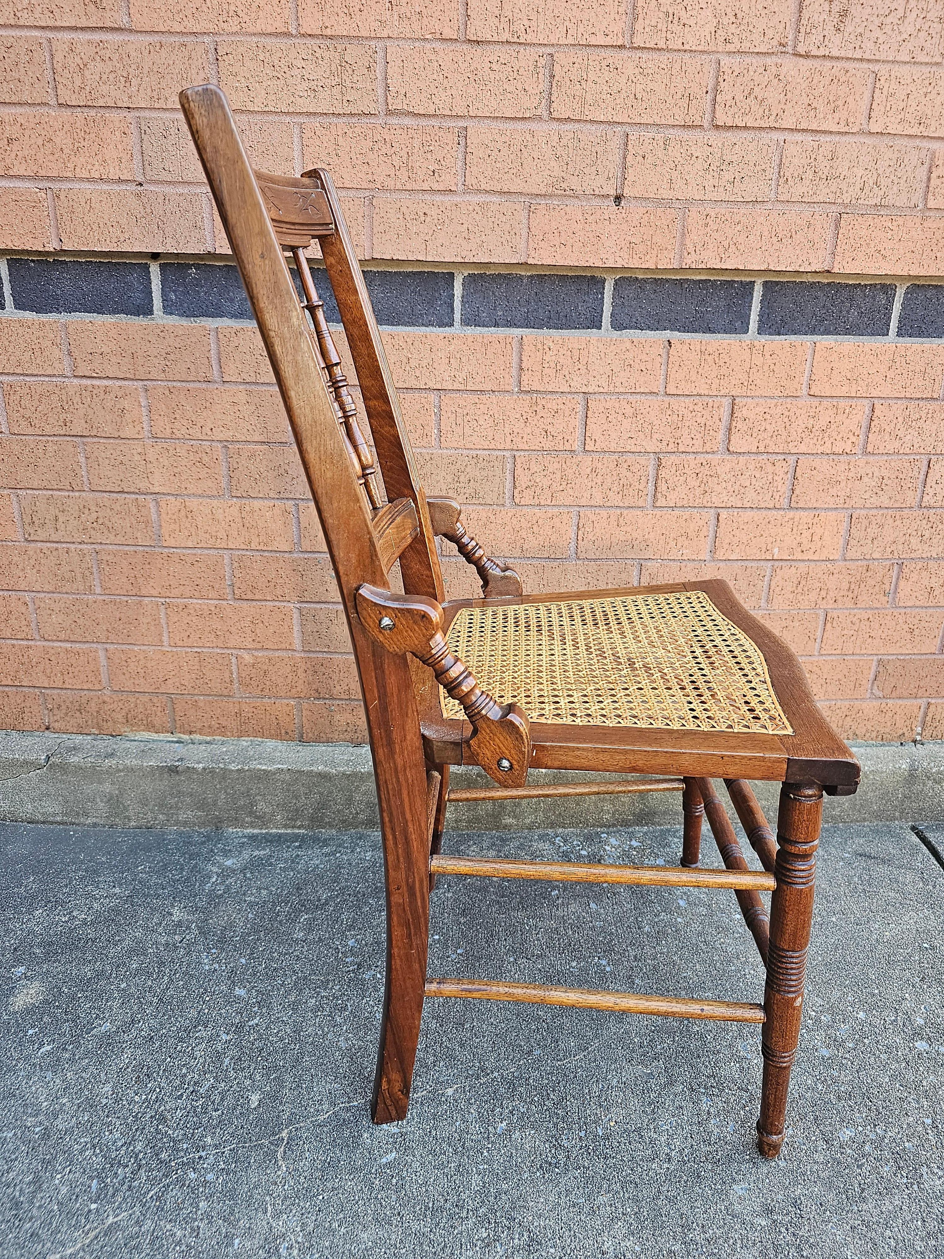 Pair of Victorian Walnut Carved and Spindle Cane Seat Side Chairs For Sale 1