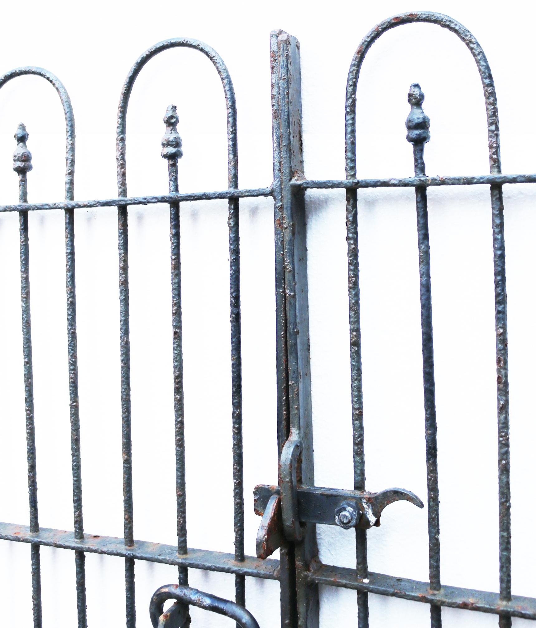 About

A pair of wrought iron gates featuring a hoop top design. 

Condition report

These gates have hinges, gate stay, posts and a working latch present. Finished in old black paint and in good condition. Posts were previously fixed to