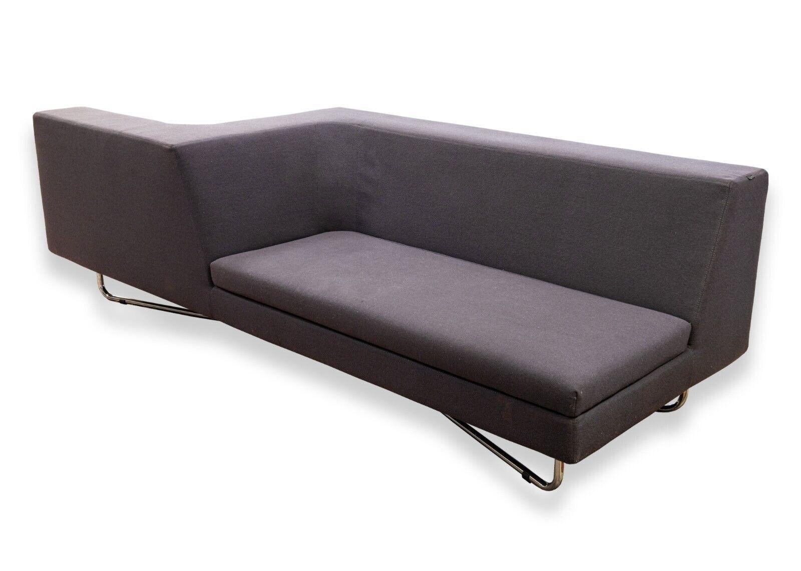 A pair of Victory left and right hand sofas by Cory Grosser for Frighetto. A fabulous pair of unique sofas featuring a mirrored left and right hand design on either sofa. These pieces have a full size sofa on one side, and on the opposing side sits