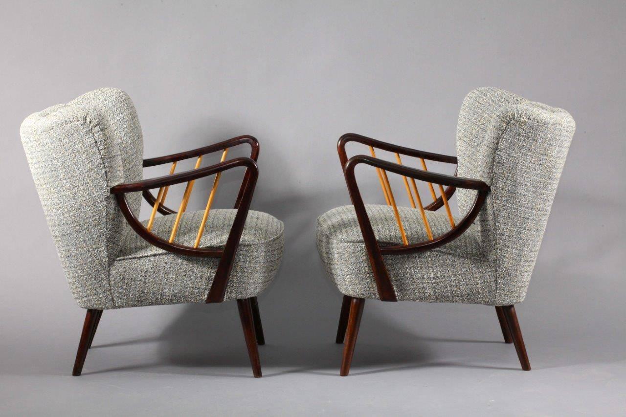 pair of armchairs,
Vienna 1950,
beech armrests, new upholstery.